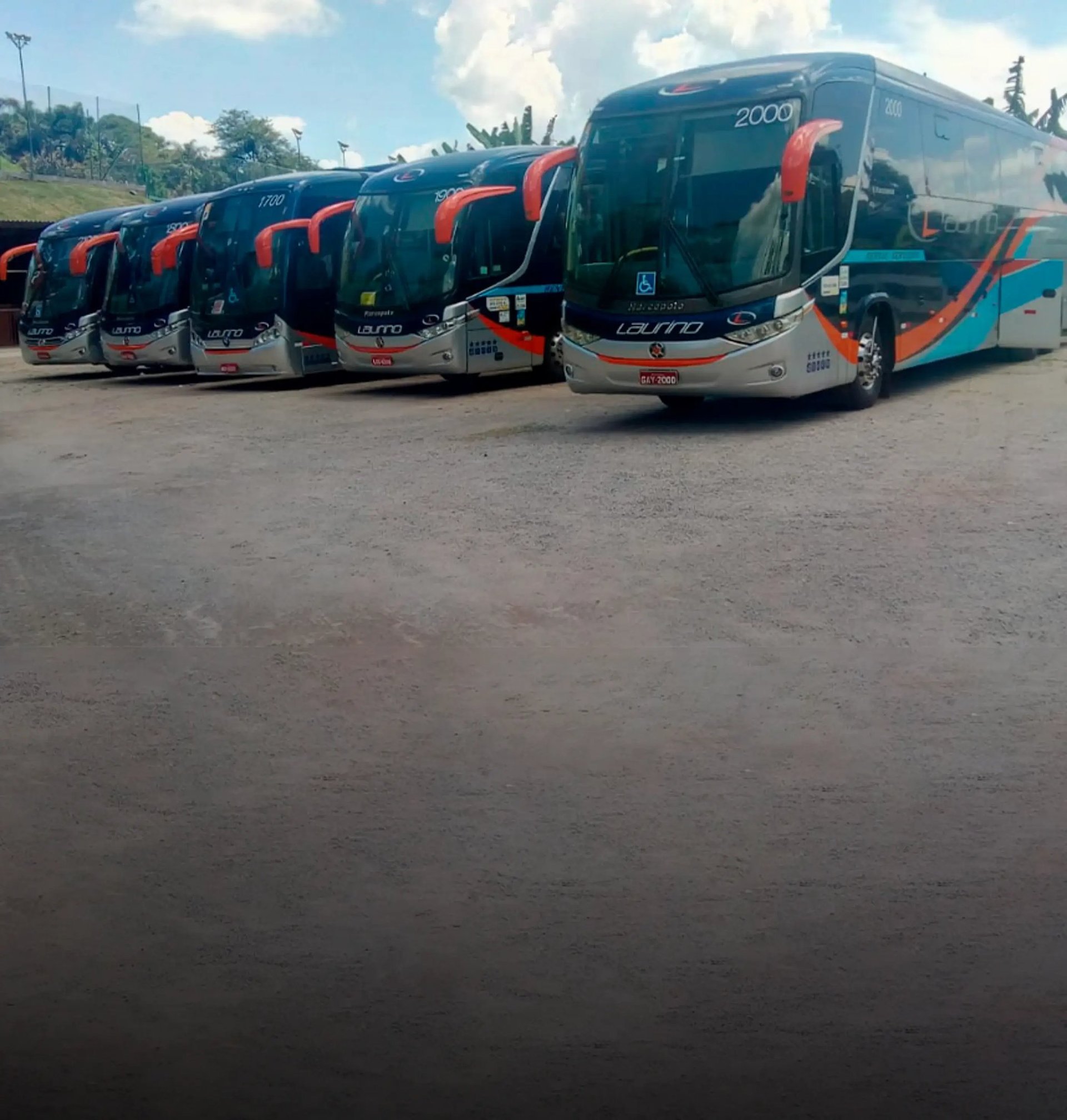 an abstract photo of a curved building with a blue sky in the background