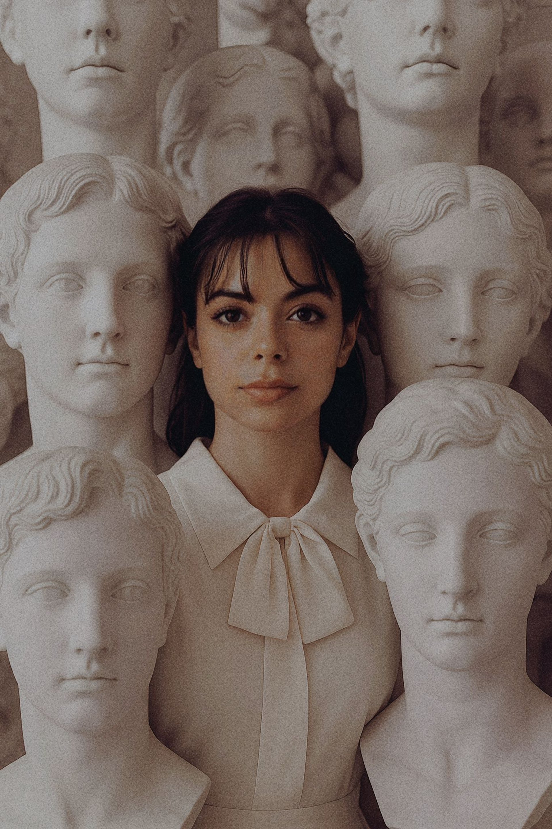 an abstract photo of a curved building with a blue sky in the background