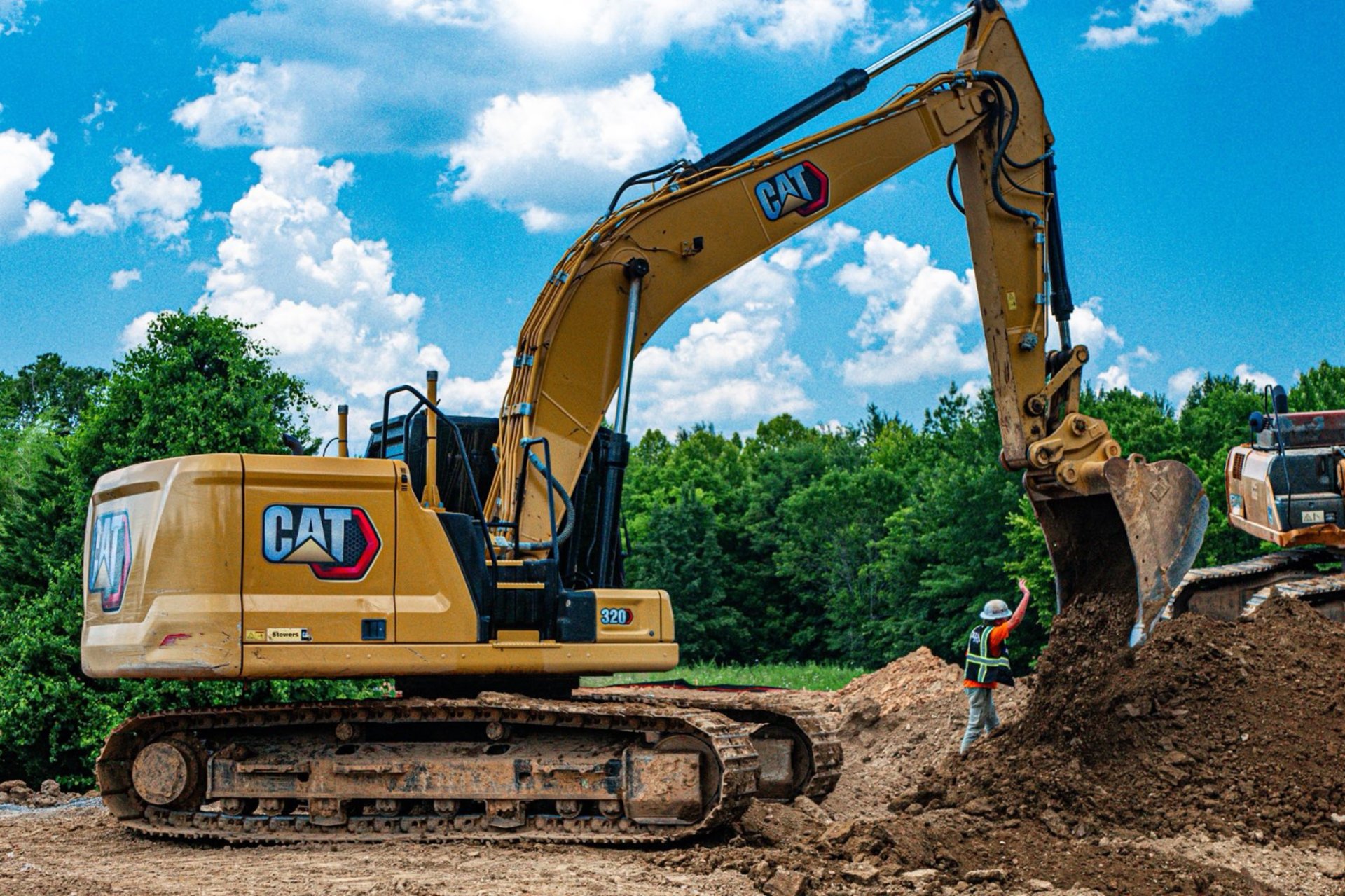 an abstract photo of a curved building with a blue sky in the background