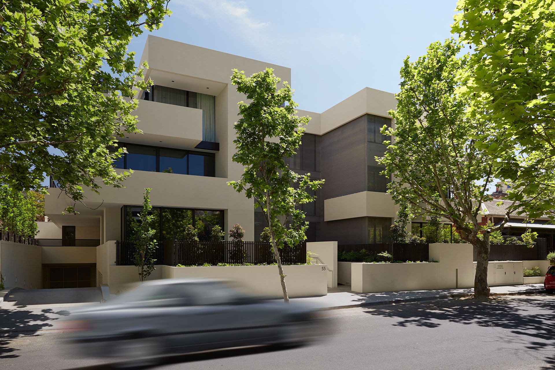 a tall building with a clock on the side of it