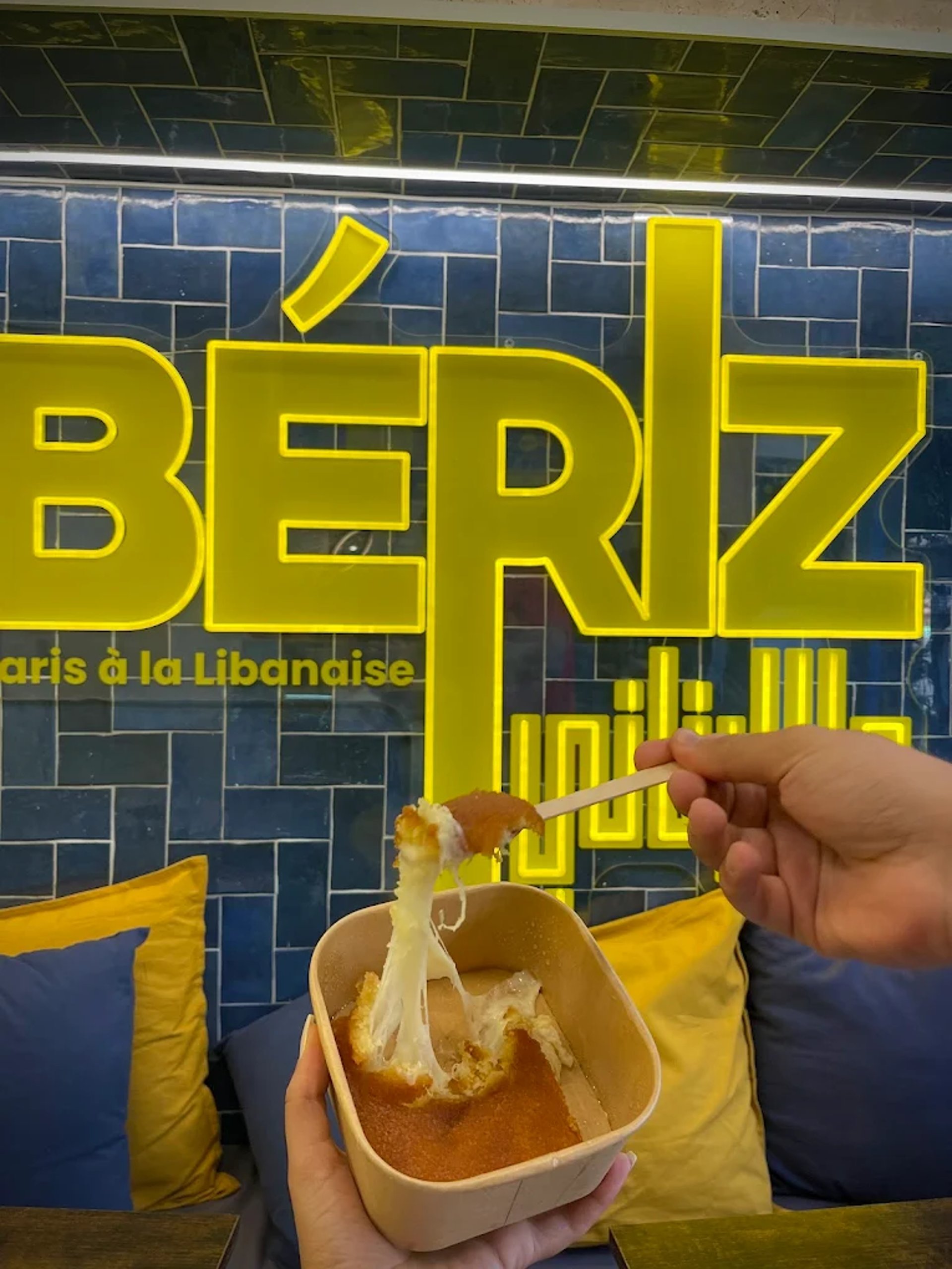 woman wearing yellow long-sleeved dress under white clouds and blue sky during daytime