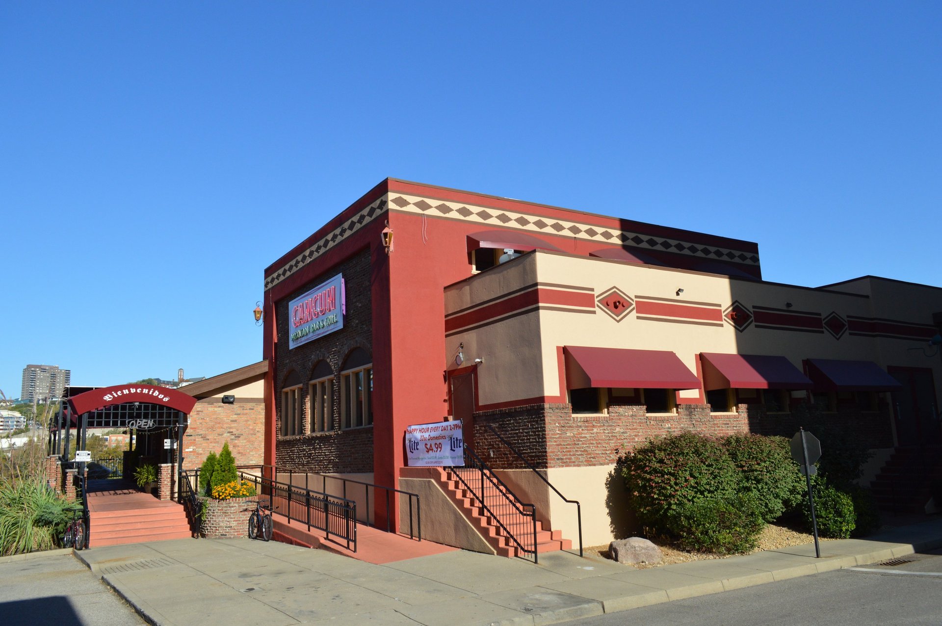 a table topped with lots of plates of food