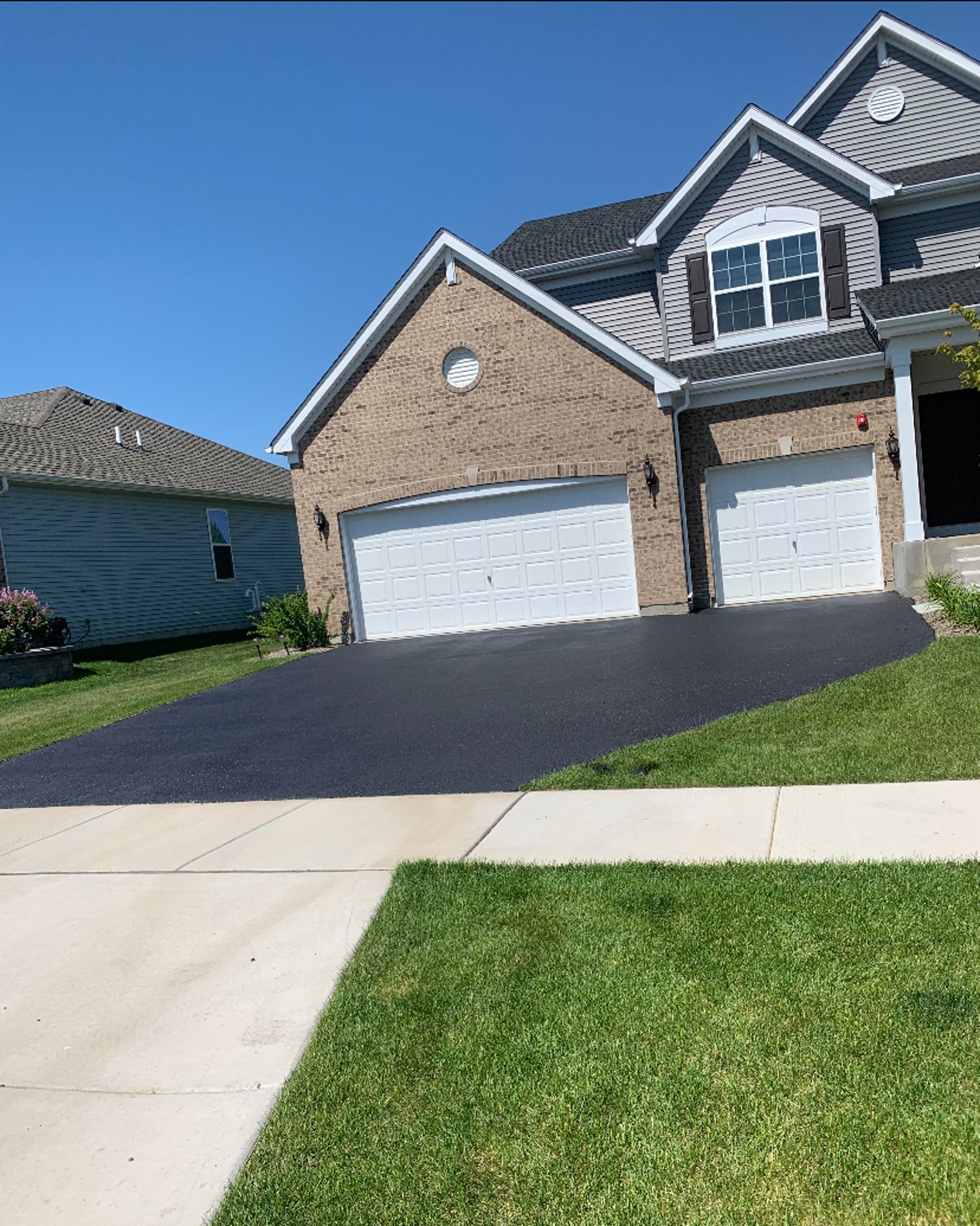 black and brown leather padded tub sofa