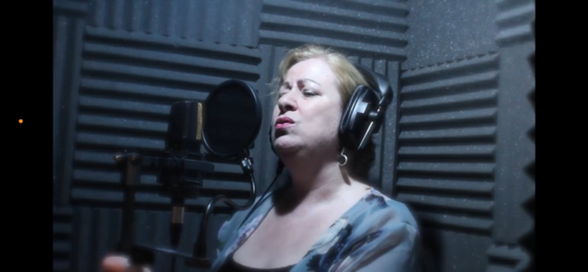 black and brown leather padded tub sofa