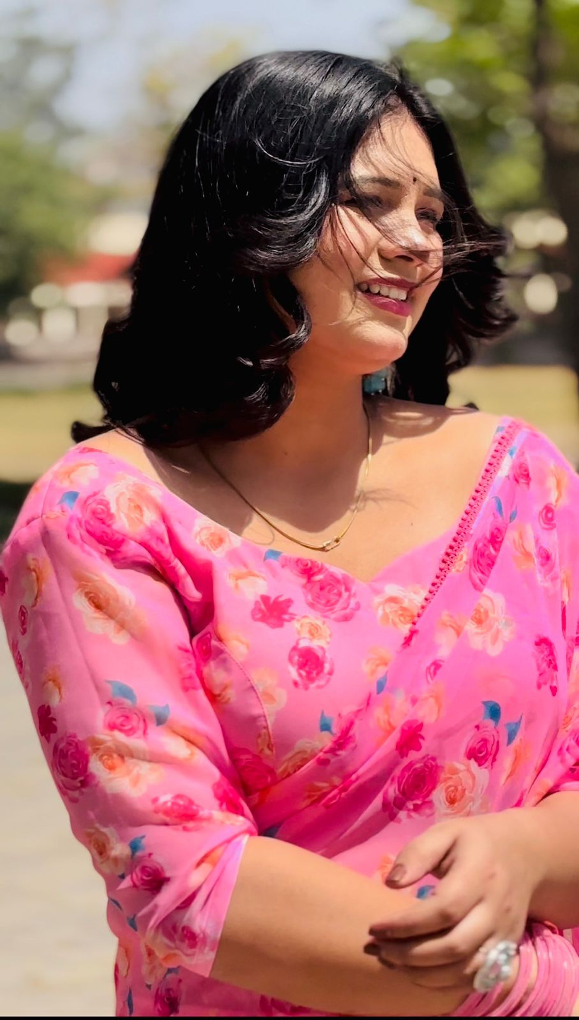 woman wearing yellow long-sleeved dress under white clouds and blue sky during daytime