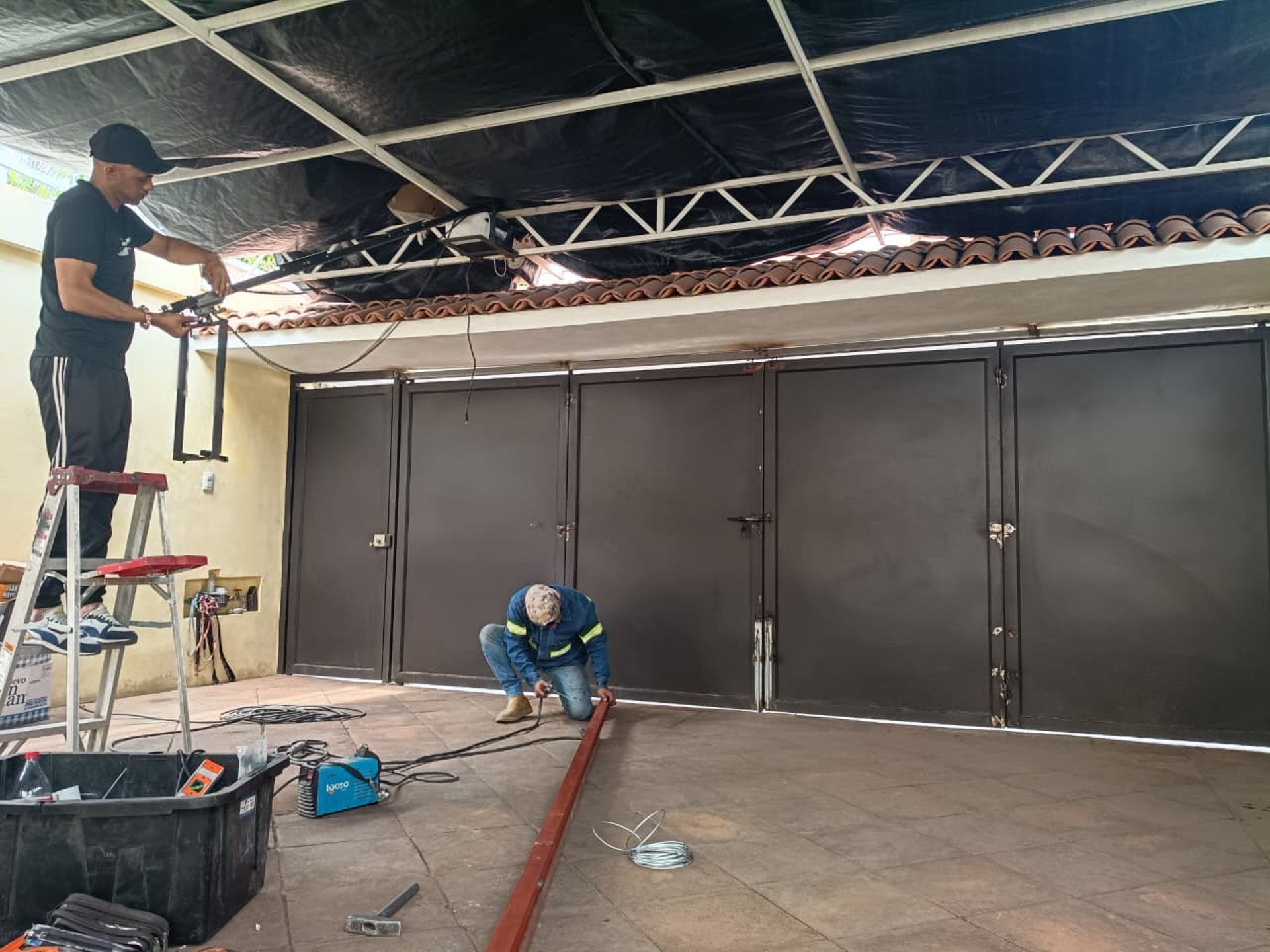 black and brown leather padded tub sofa