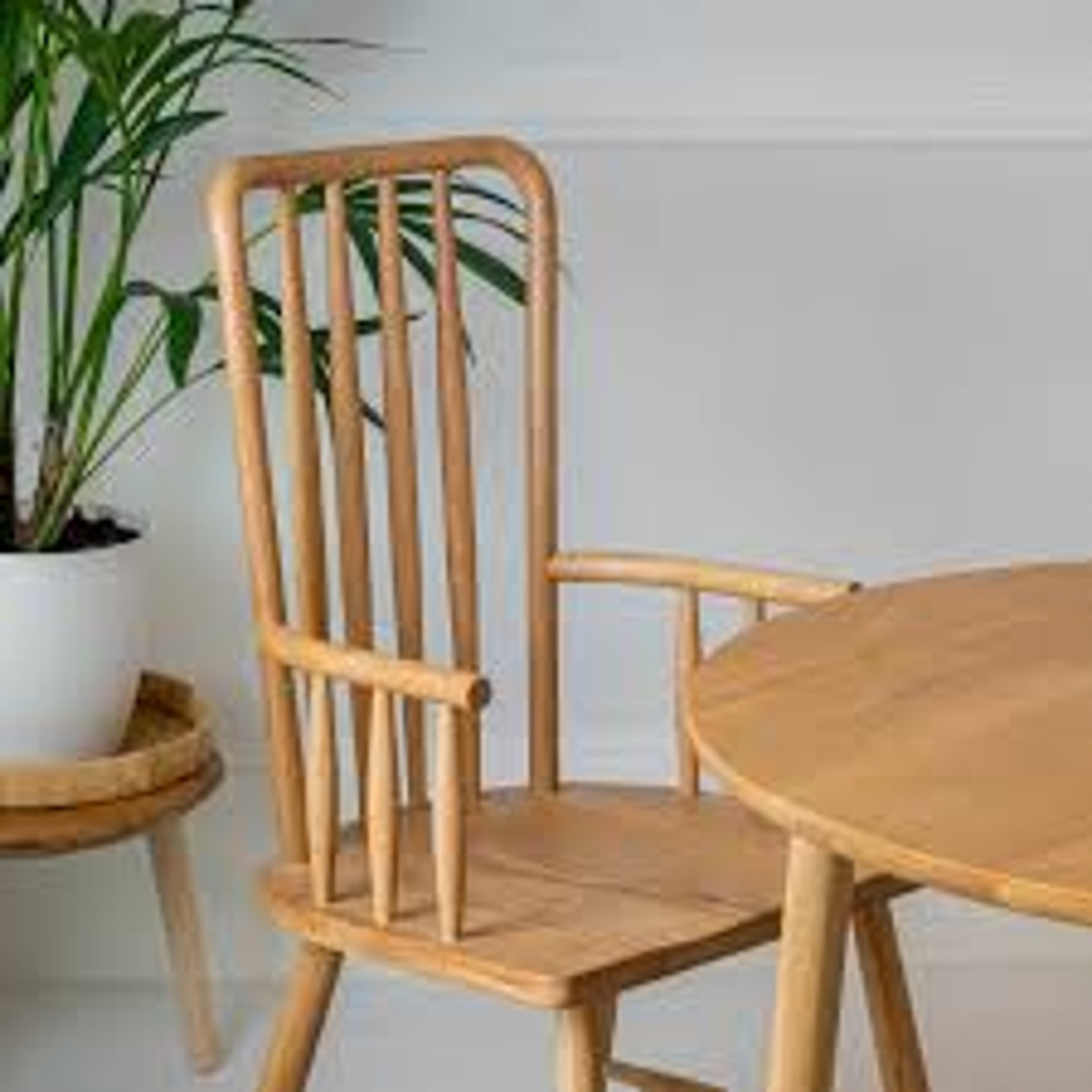 an abstract photo of a curved building with a blue sky in the background