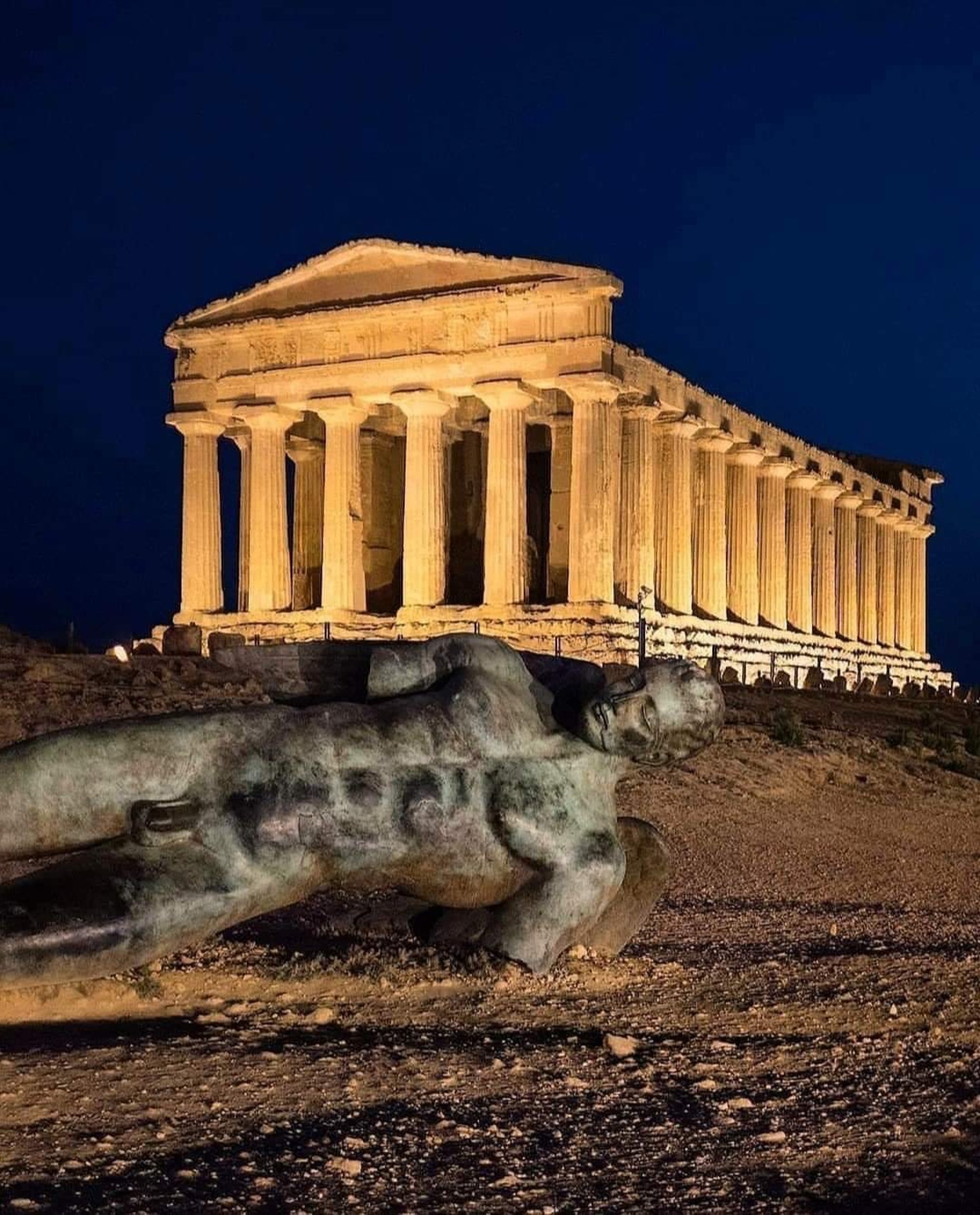 woman wearing yellow long-sleeved dress under white clouds and blue sky during daytime