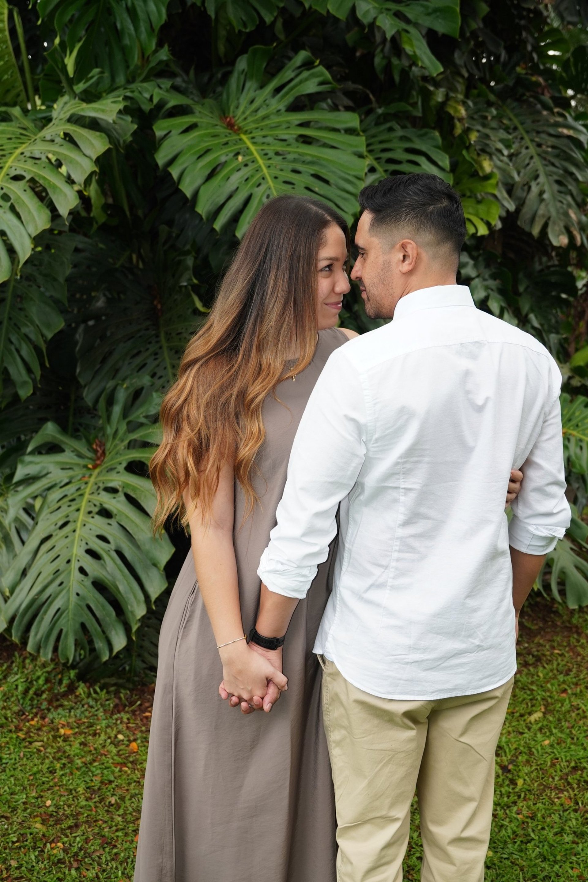couple wearing silver-colored rings