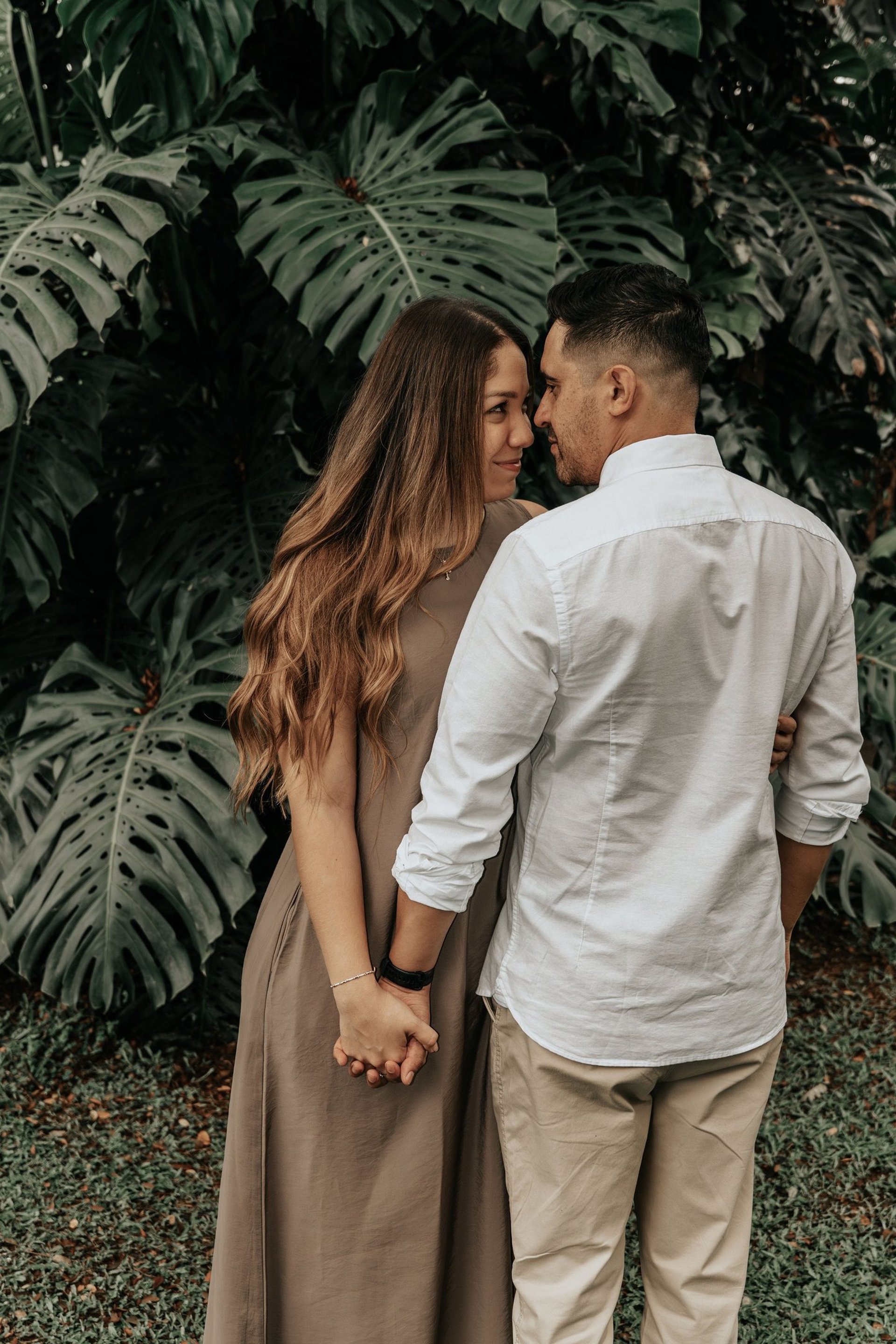 couple wearing silver-colored rings
