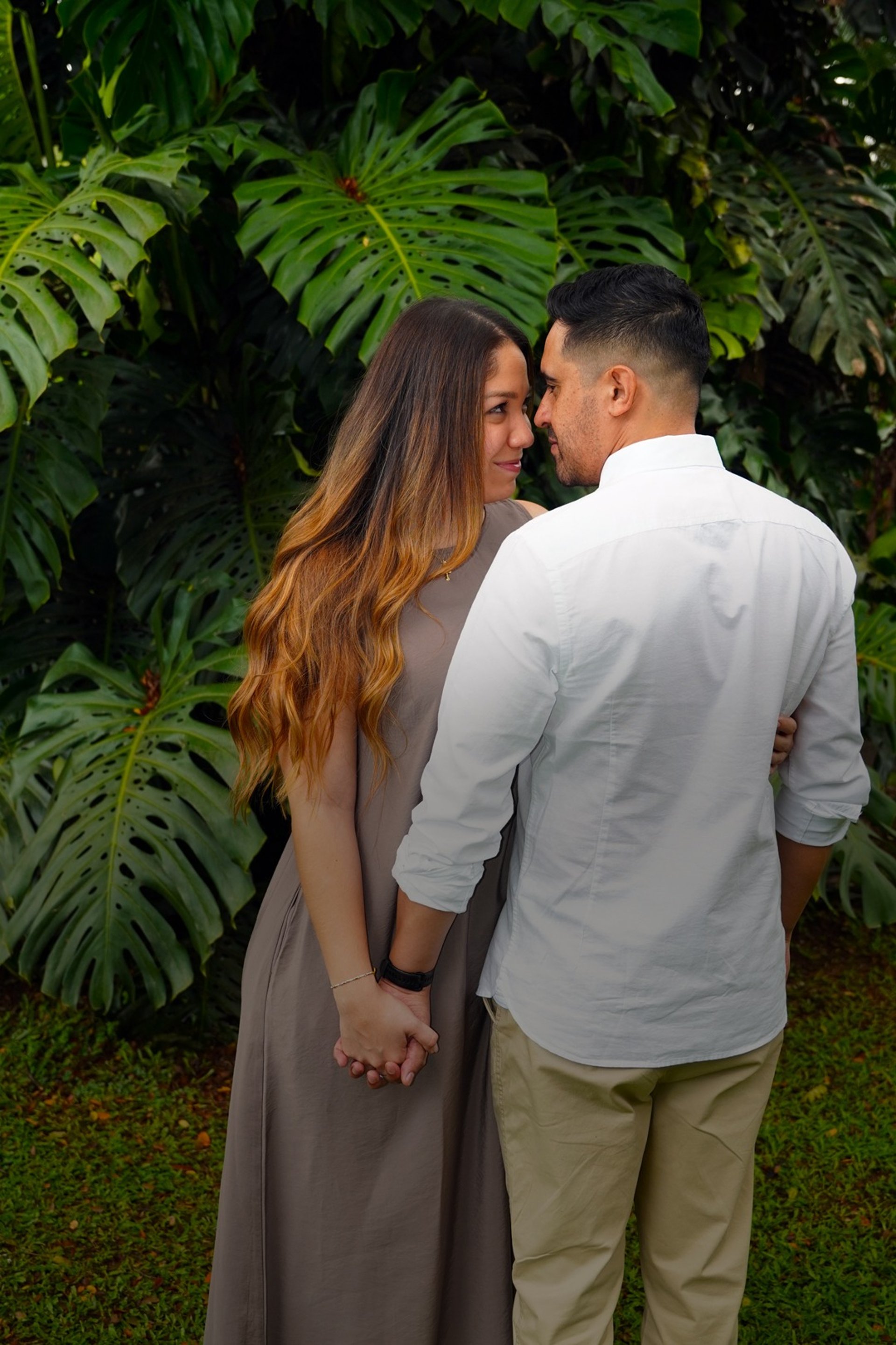 couple wearing silver-colored rings