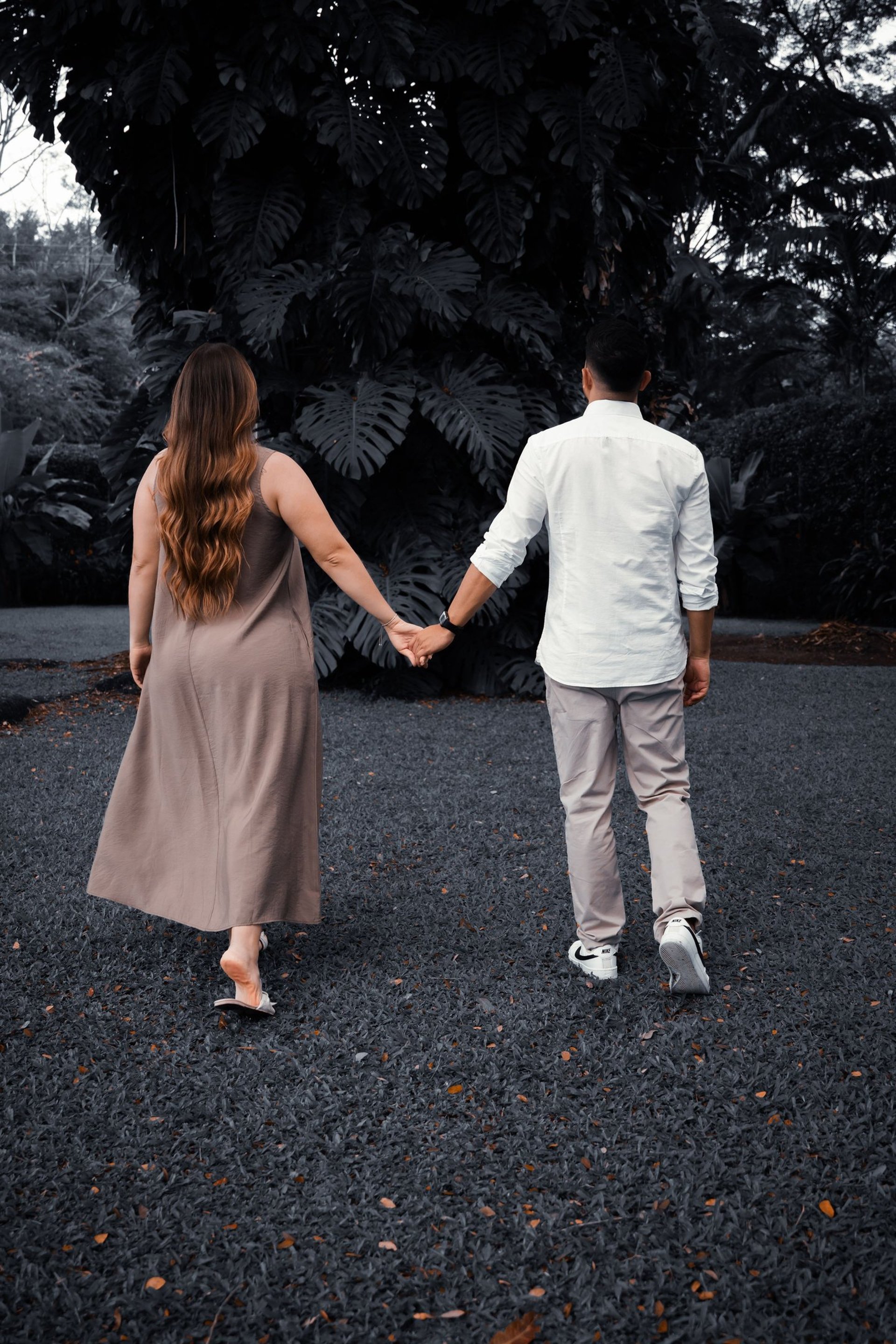 couple wearing silver-colored rings