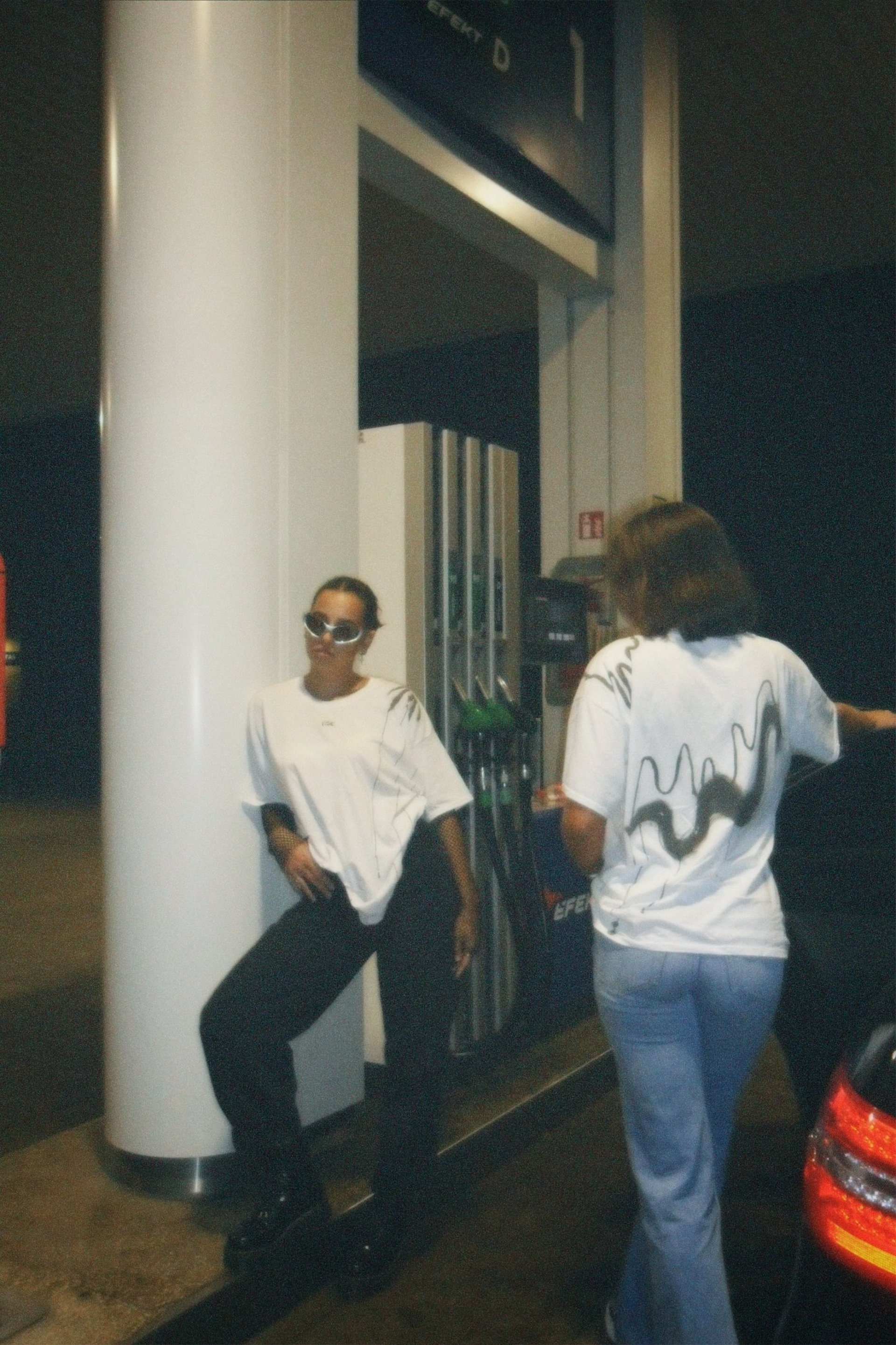 person wearing grey knit sweater