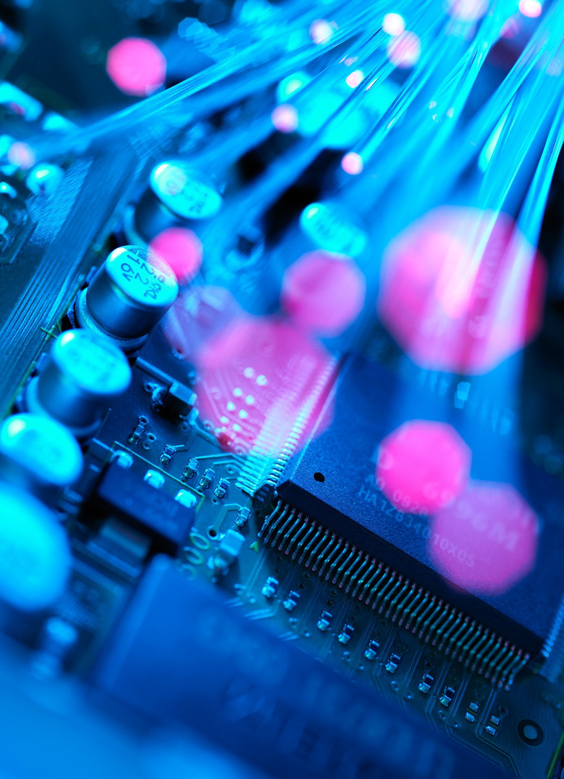 an abstract photo of a curved building with a blue sky in the background