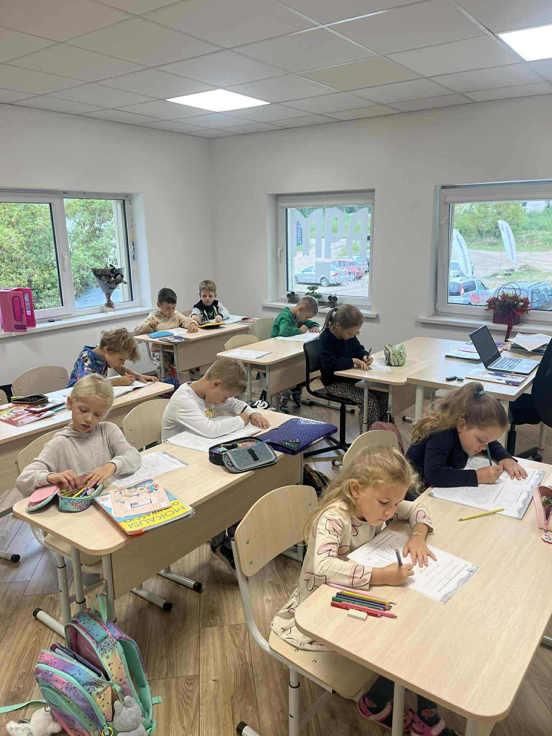 woman wearing yellow long-sleeved dress under white clouds and blue sky during daytime