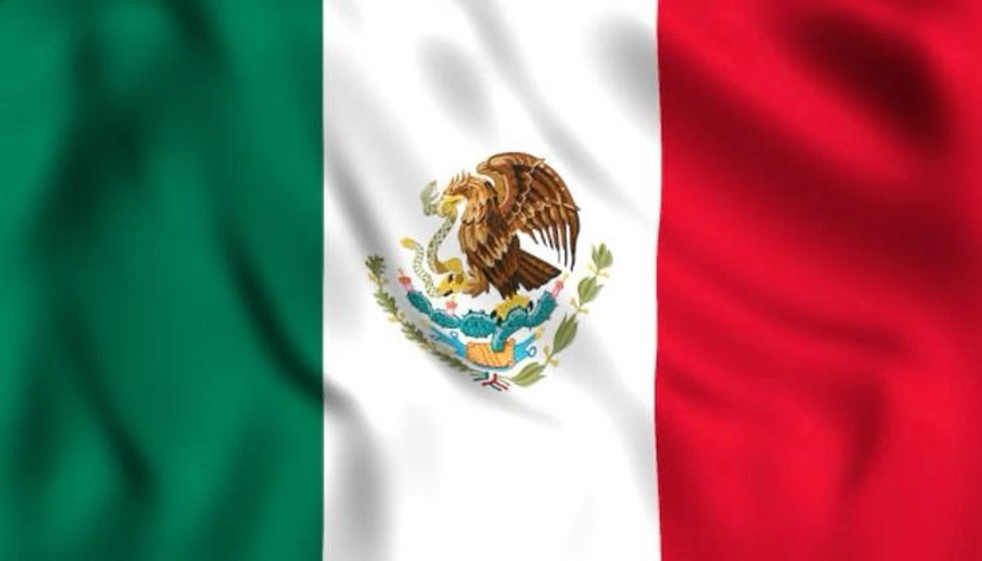 calm body of water surround with mountain during daytime