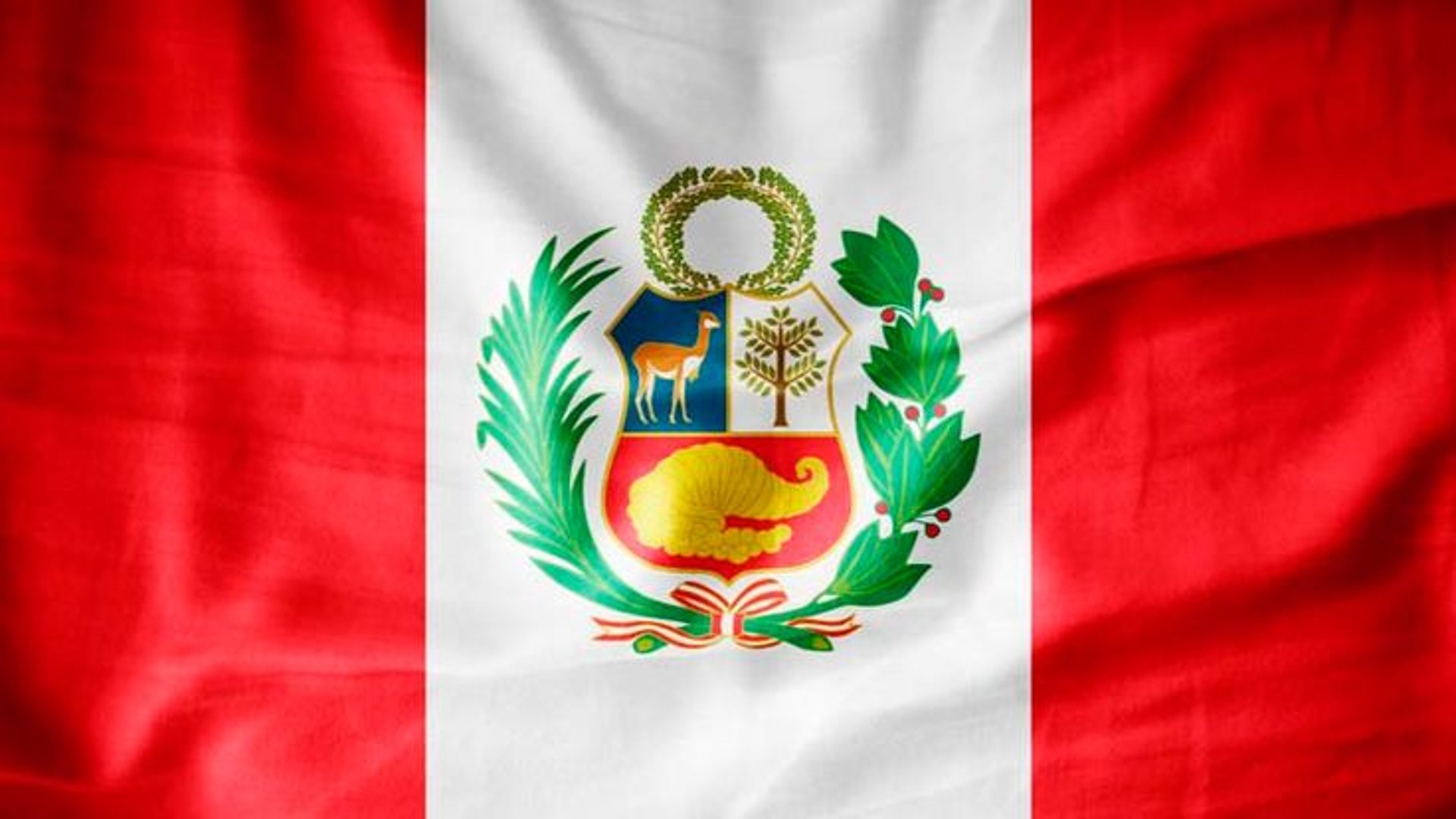 calm body of water surround with mountain during daytime