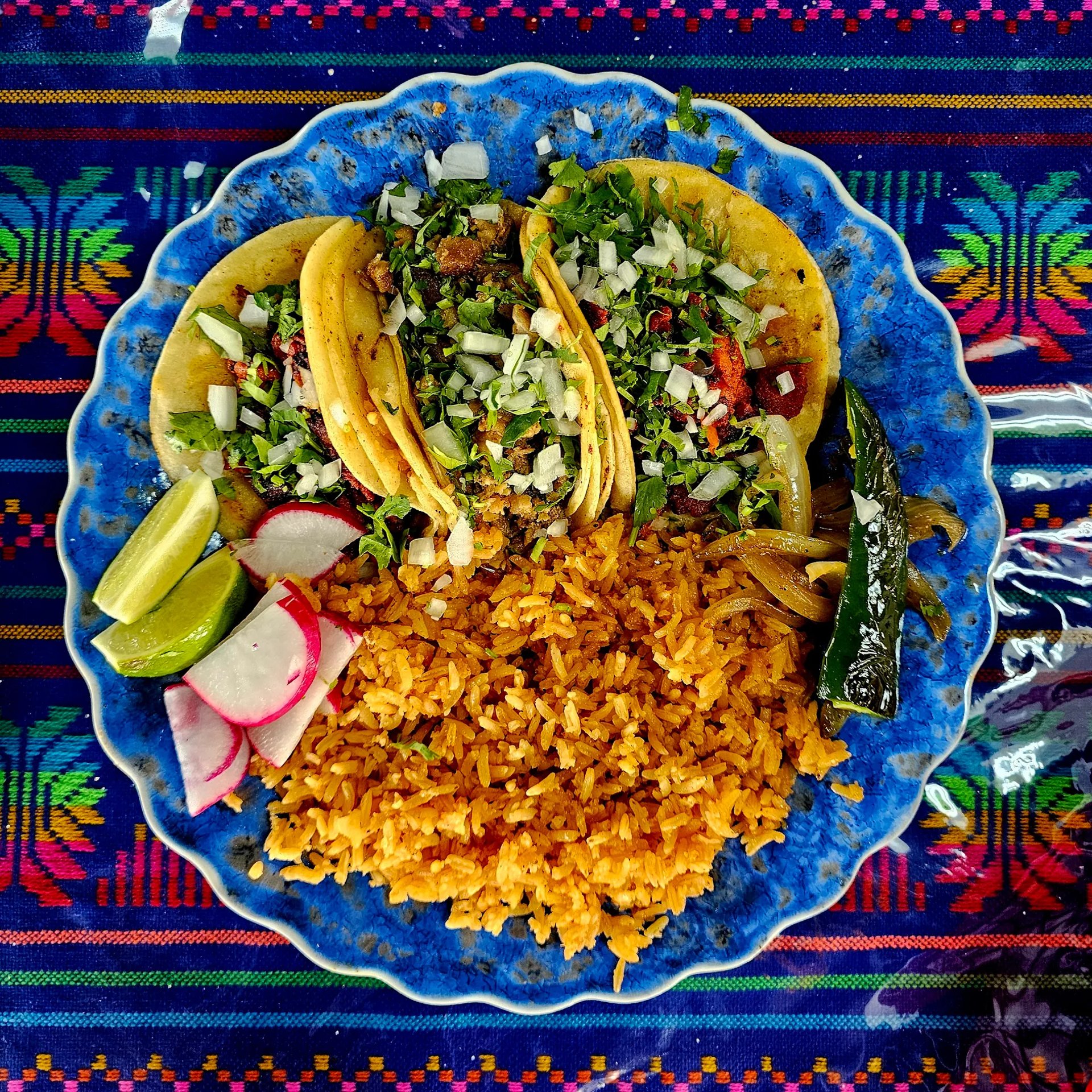 woman wearing yellow long-sleeved dress under white clouds and blue sky during daytime
