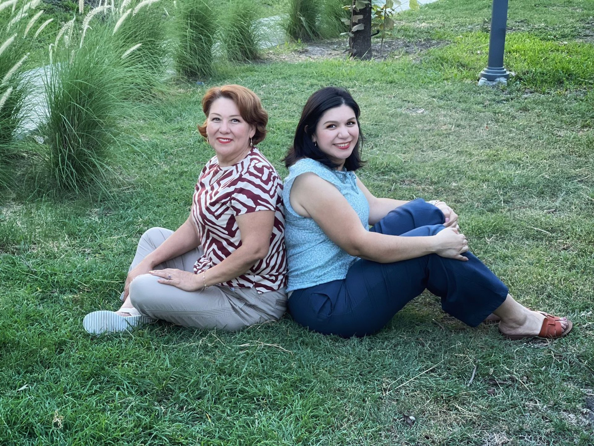 woman in orange blazer sitting on car seat