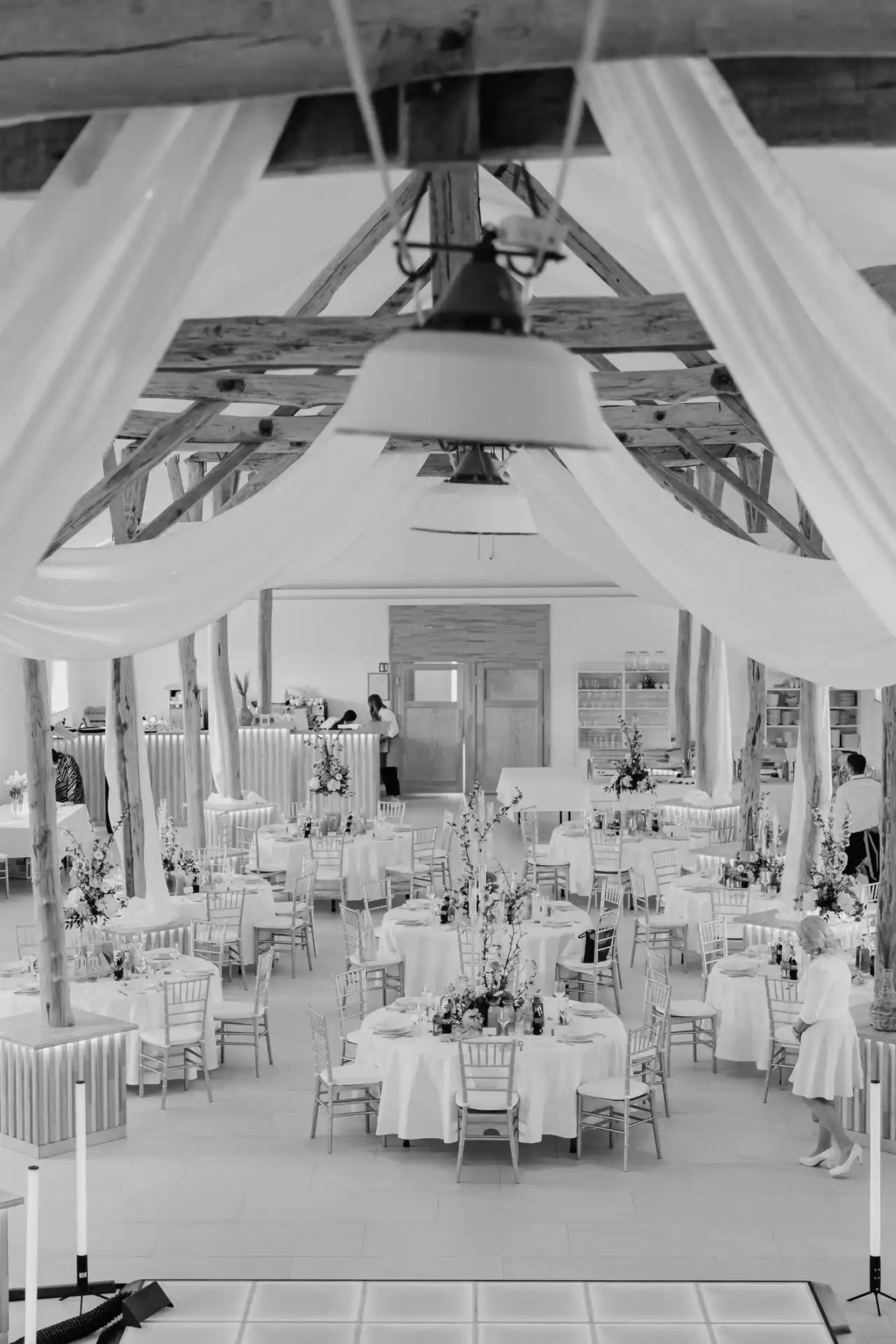an abstract photo of a curved building with a blue sky in the background