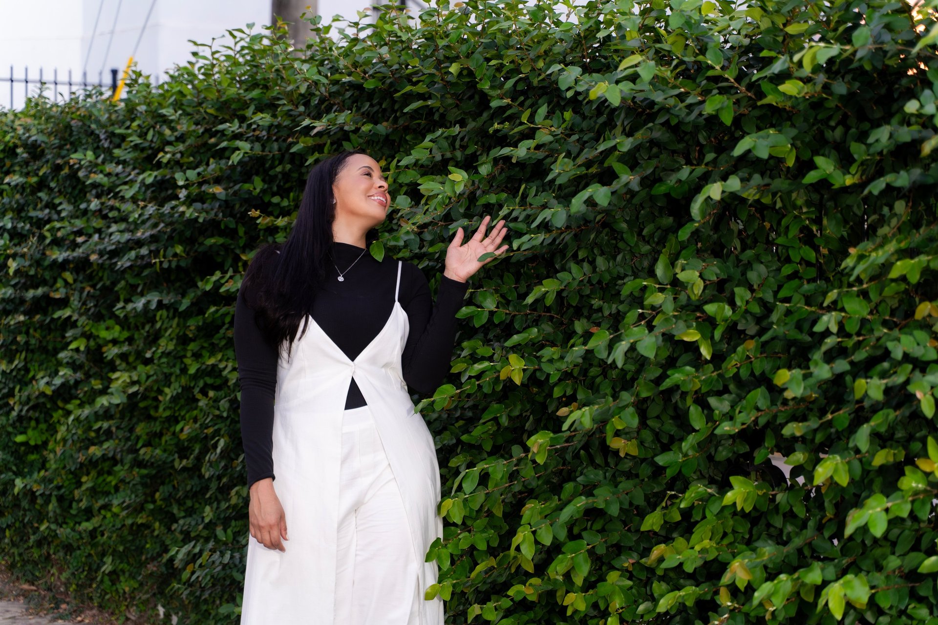 person holding white acoustic guitar