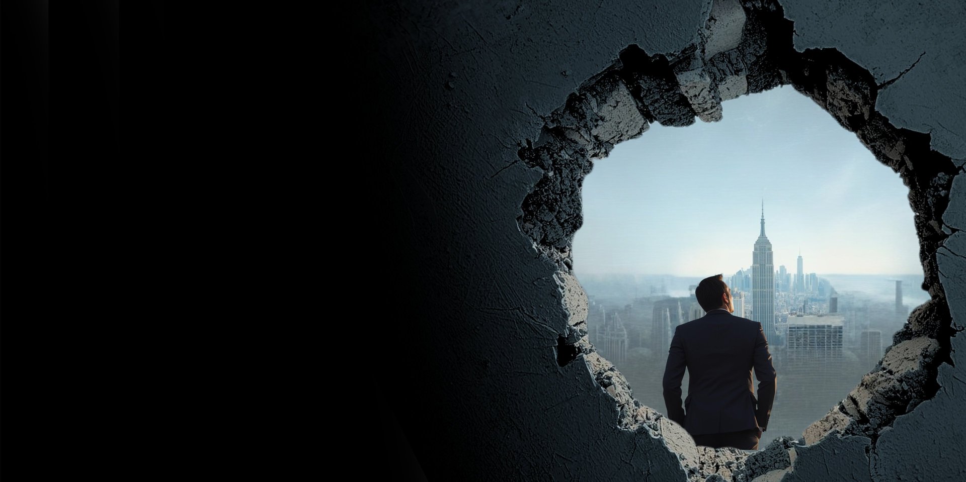 an abstract photo of a curved building with a blue sky in the background