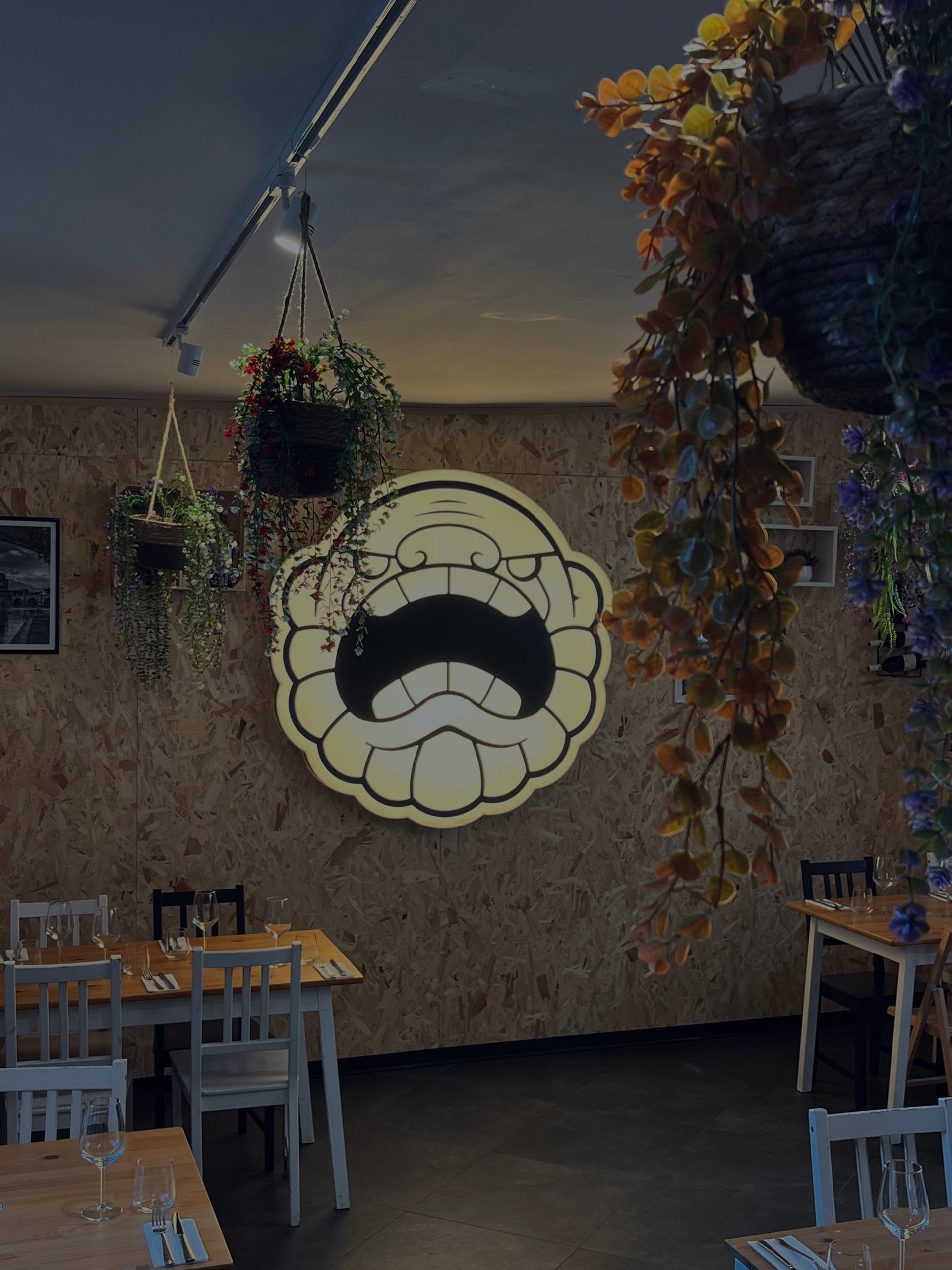 tables and chairs inside building