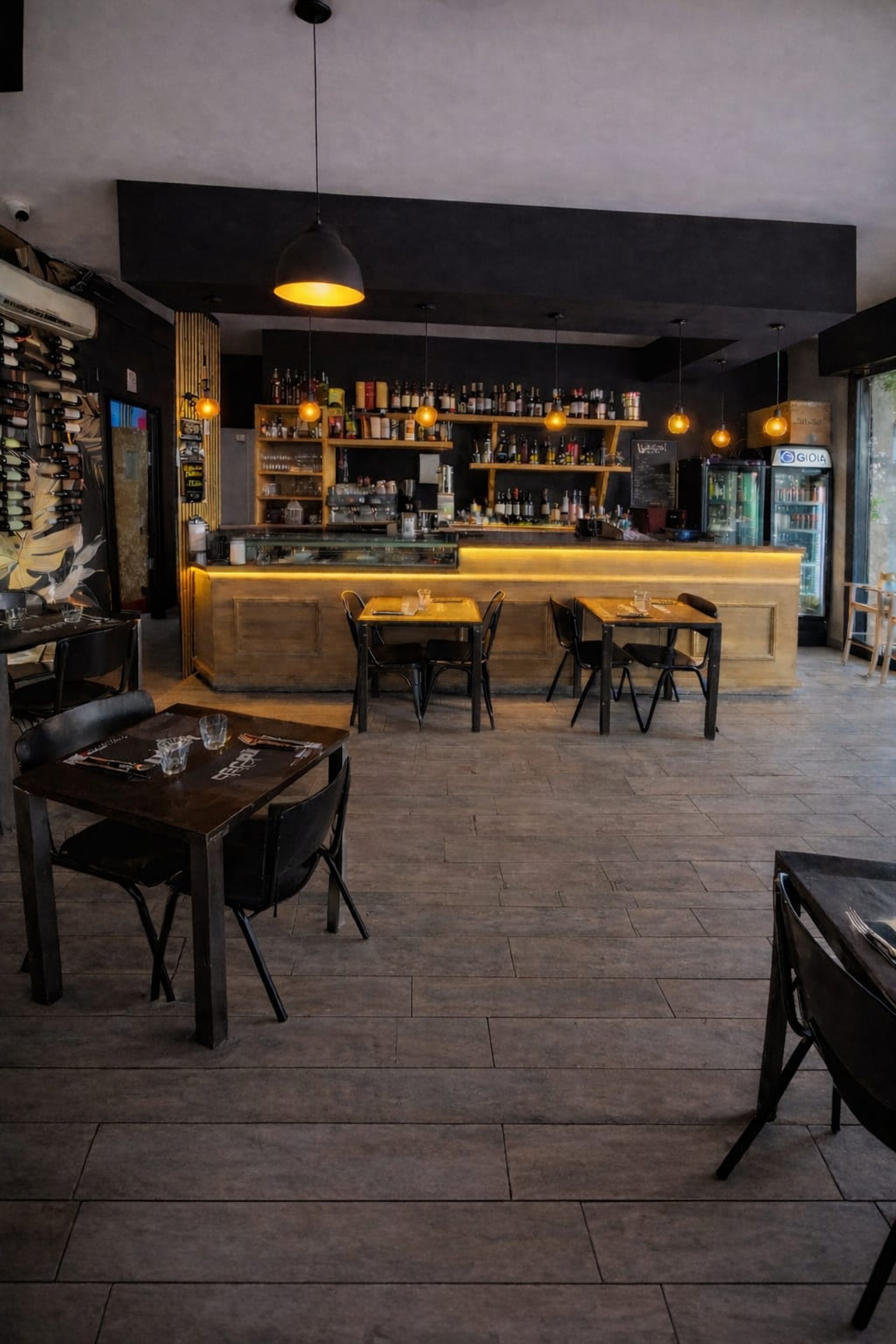 tables and chairs inside building