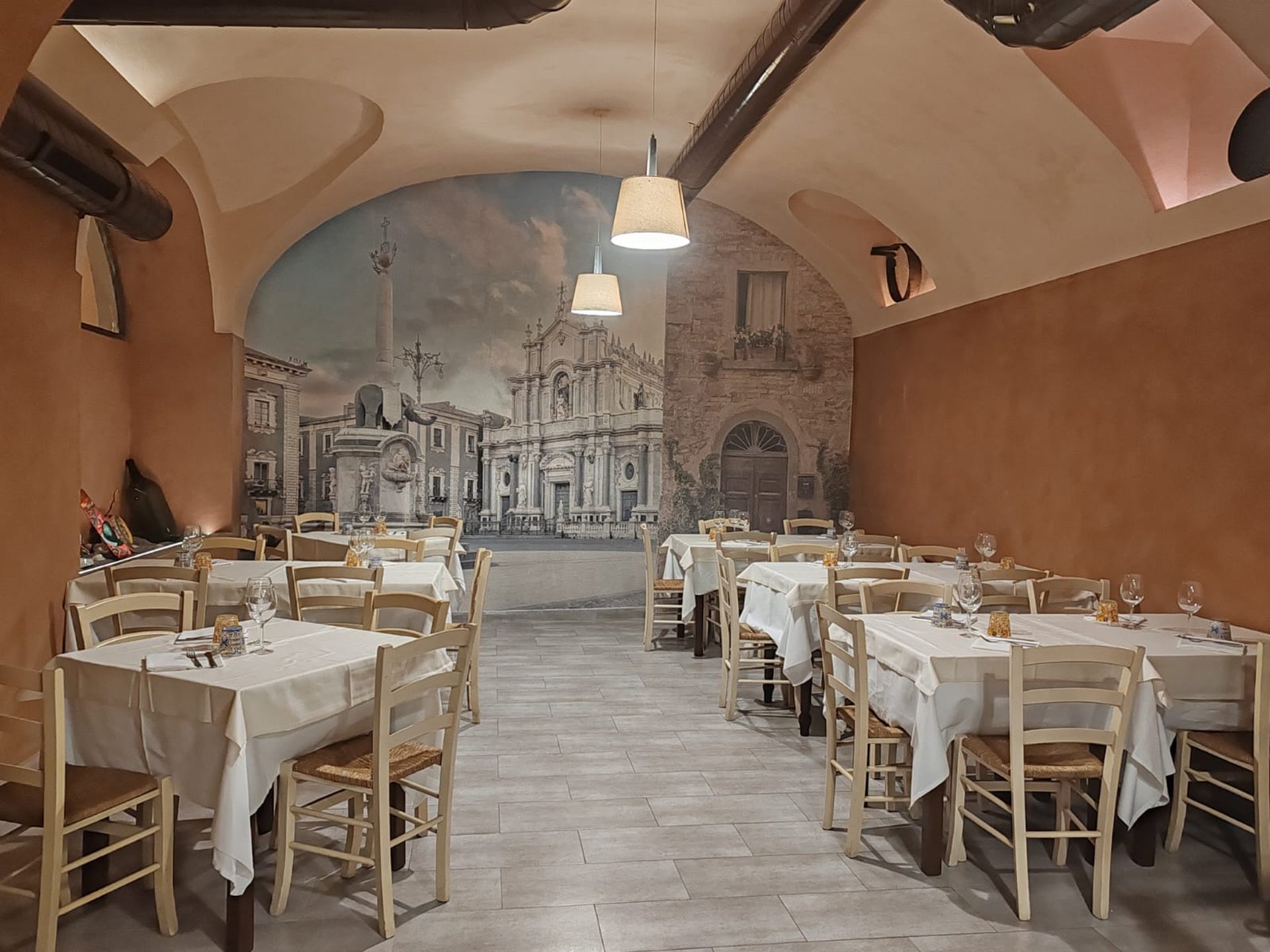 woman wearing yellow long-sleeved dress under white clouds and blue sky during daytime