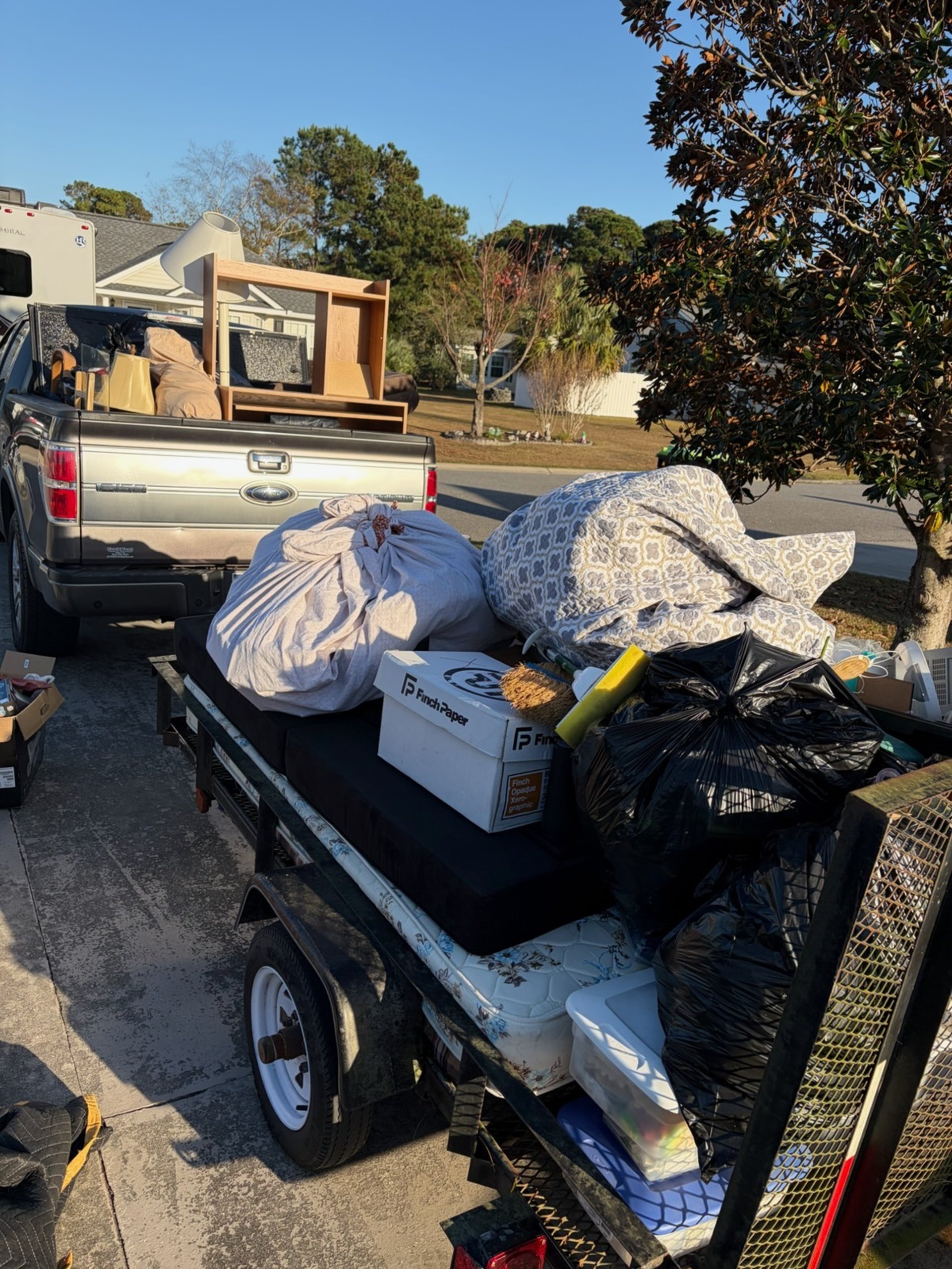 woman wearing yellow long-sleeved dress under white clouds and blue sky during daytime