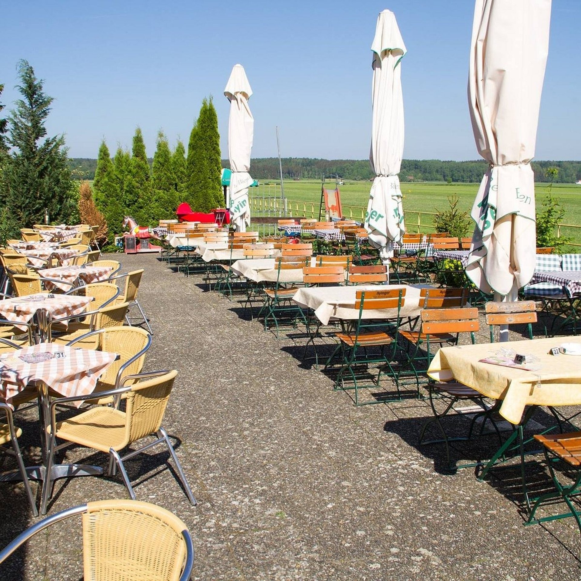 woman wearing yellow long-sleeved dress under white clouds and blue sky during daytime