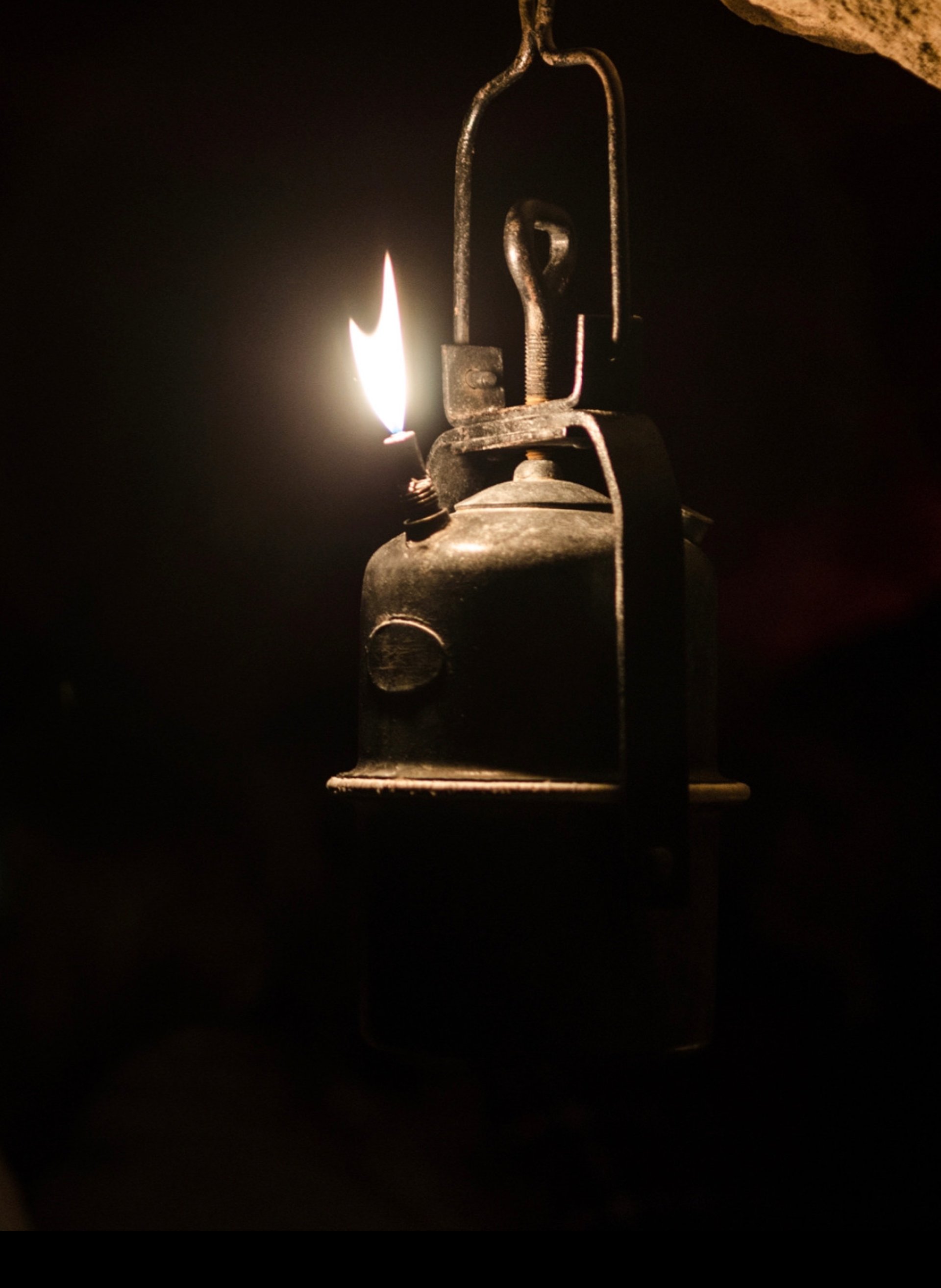 an abstract photo of a curved building with a blue sky in the background