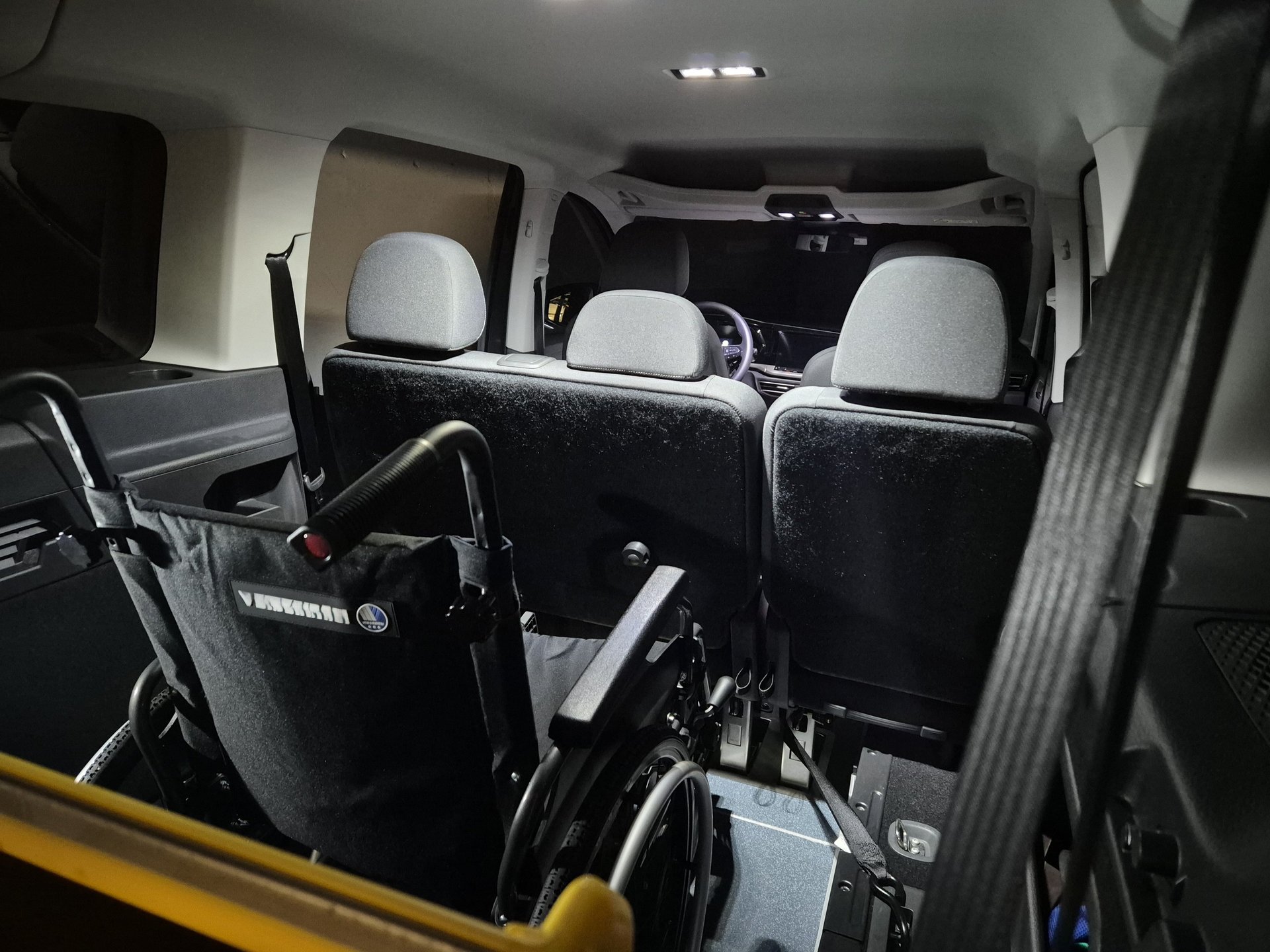 black and brown leather padded tub sofa