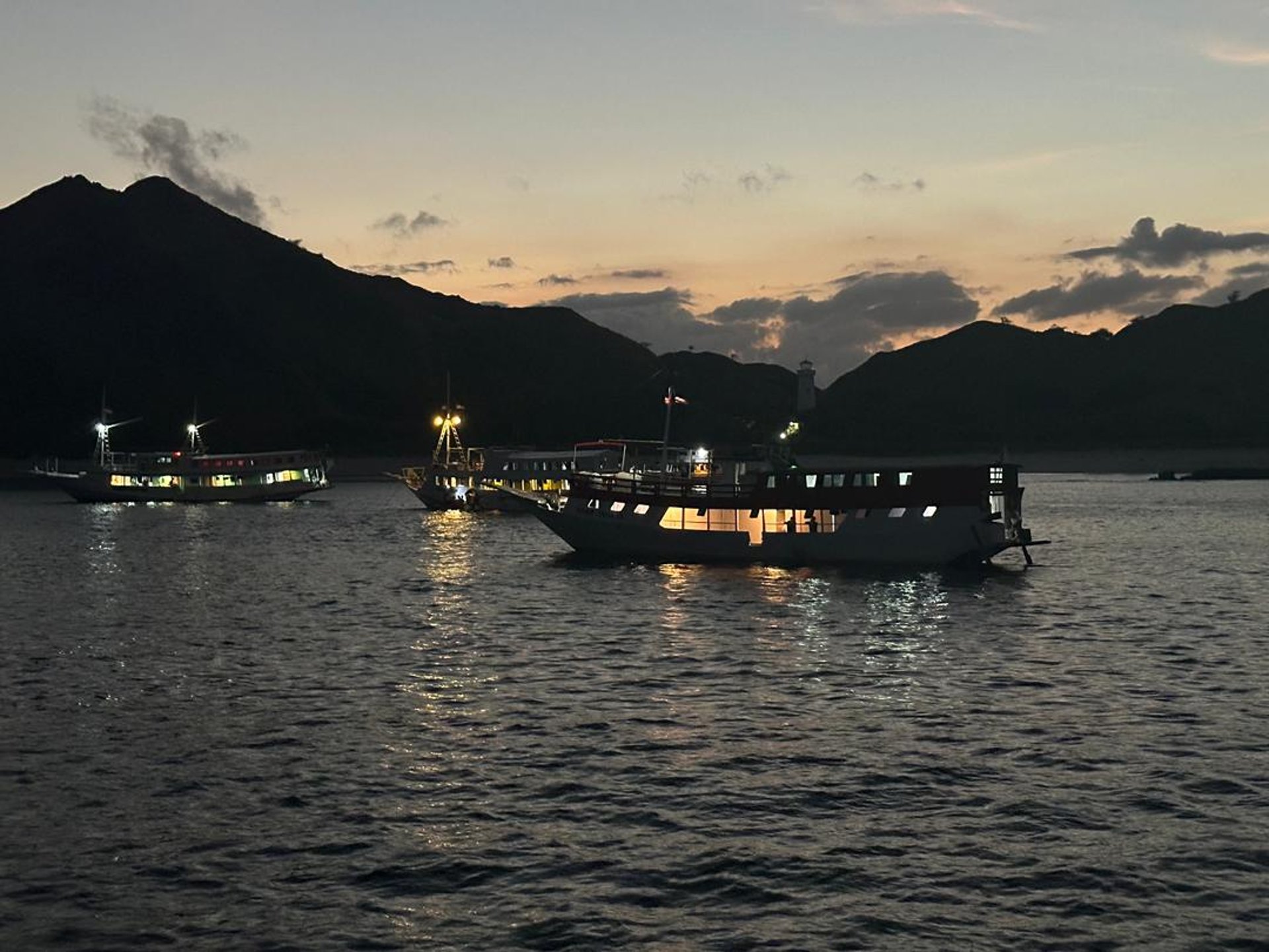 woman wearing yellow long-sleeved dress under white clouds and blue sky during daytime