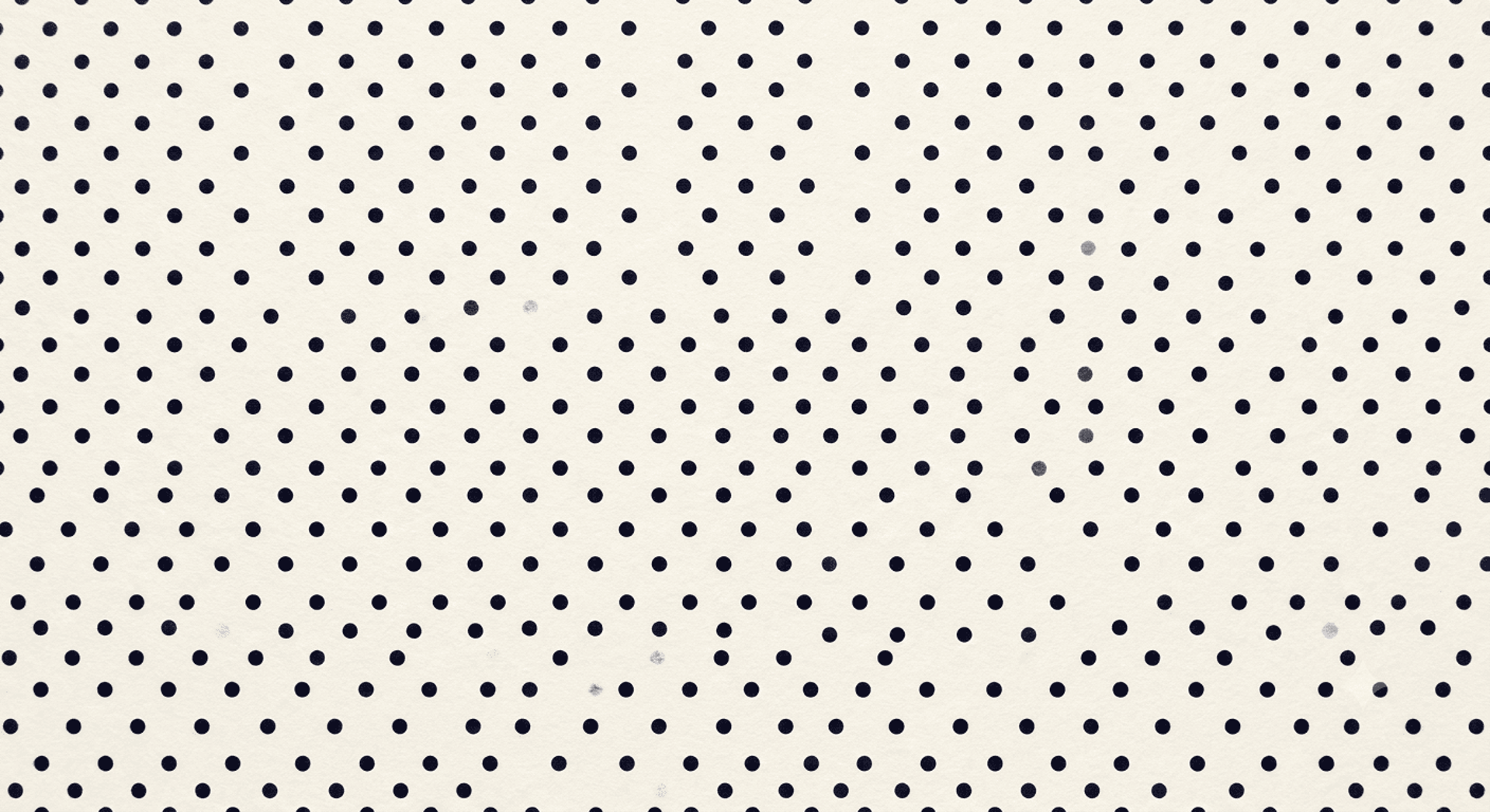 a piece of black and white paper with torn edges