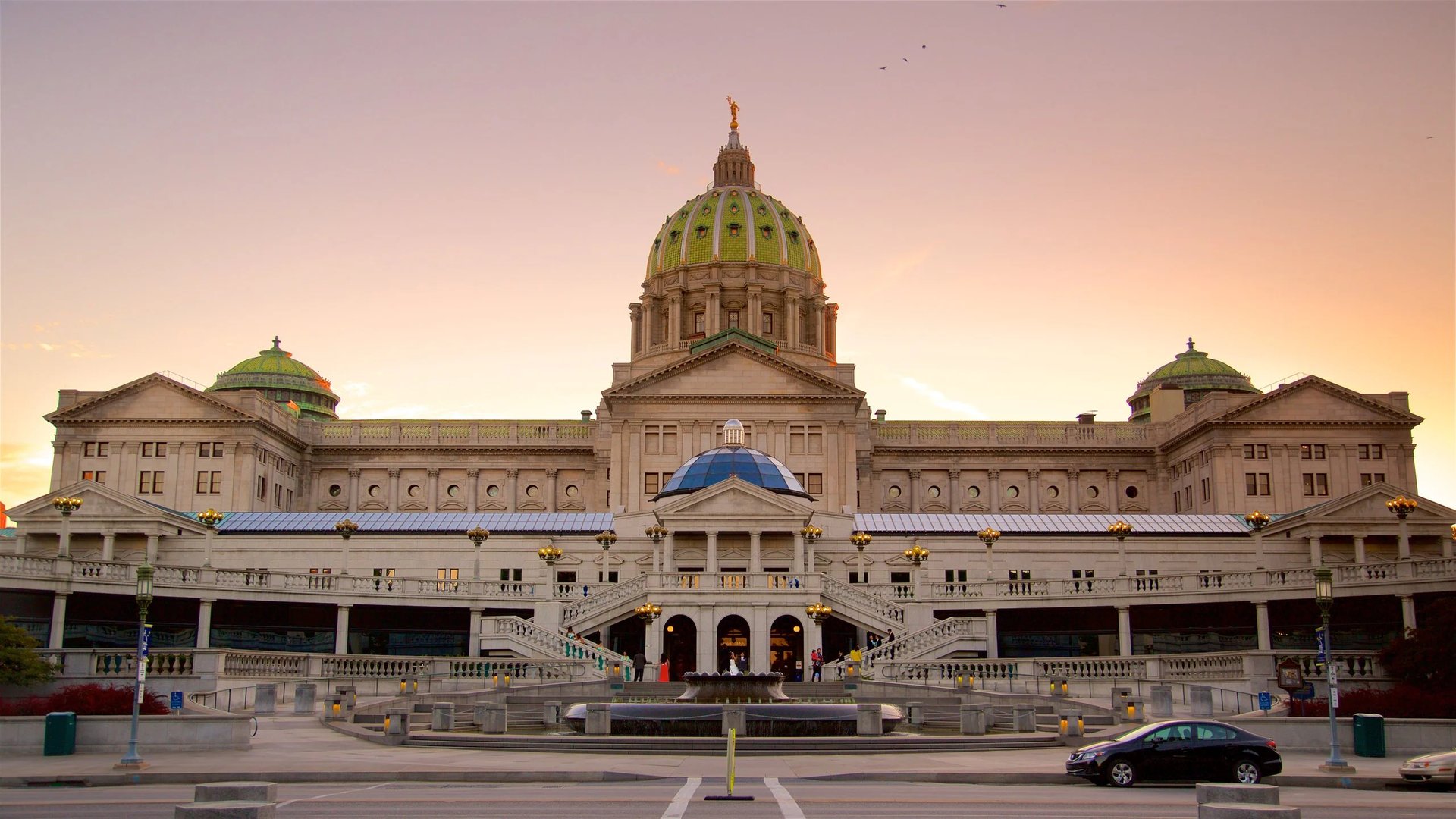 group of people standing on green grass field during daytime