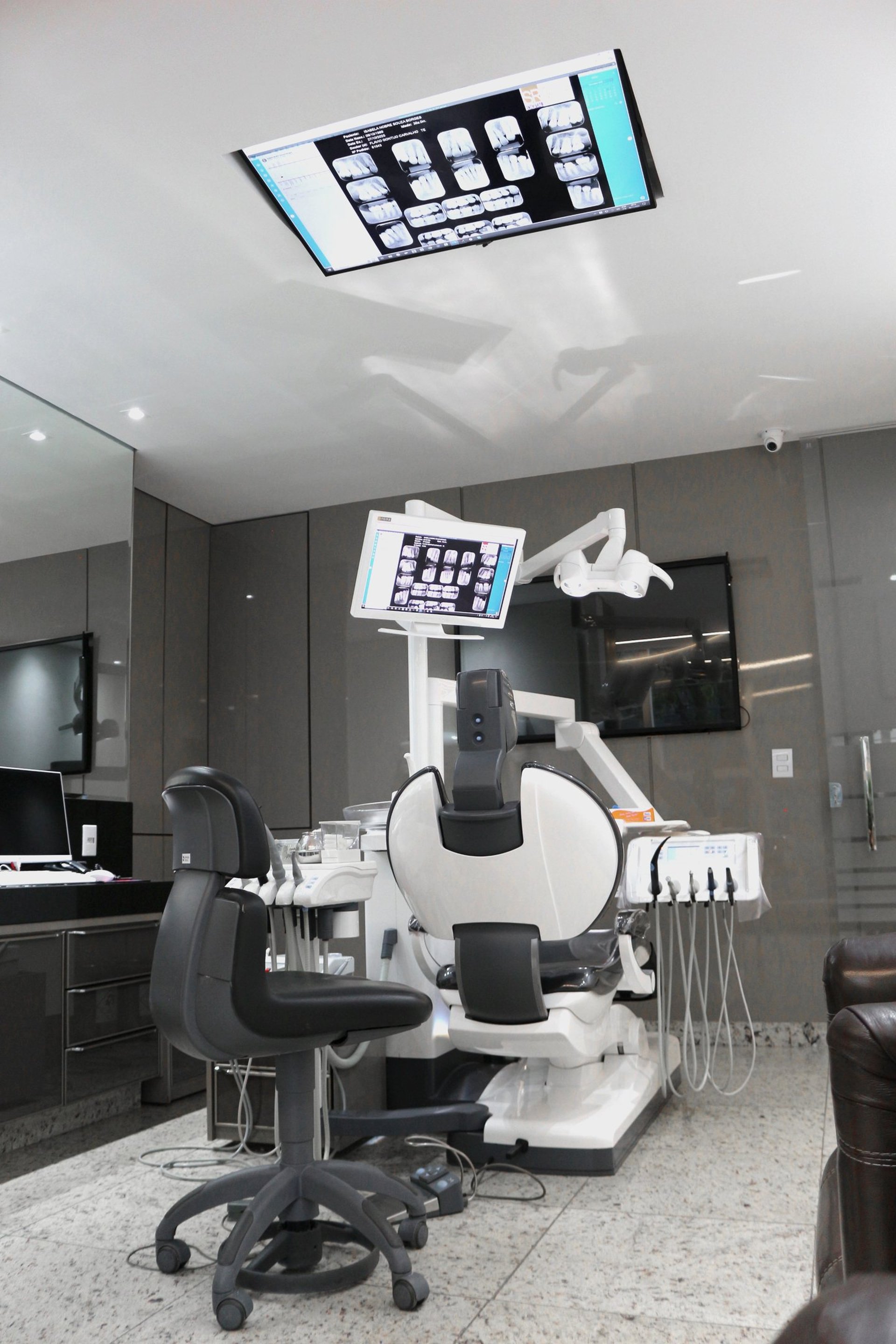 an abstract photo of a curved building with a blue sky in the background