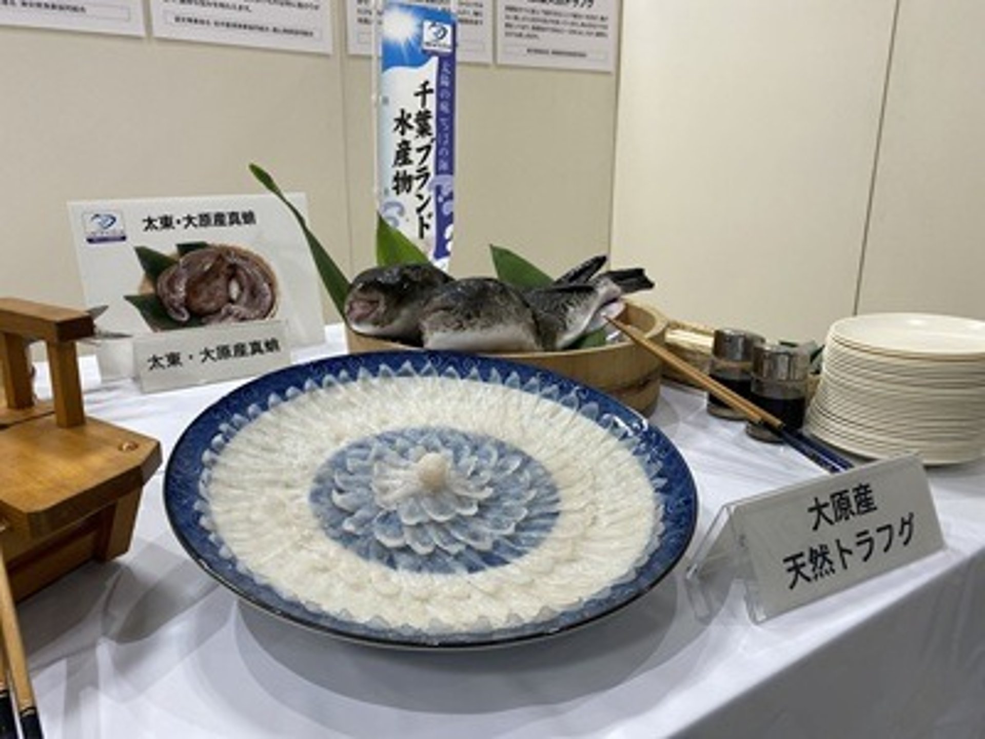 an abstract photo of a curved building with a blue sky in the background