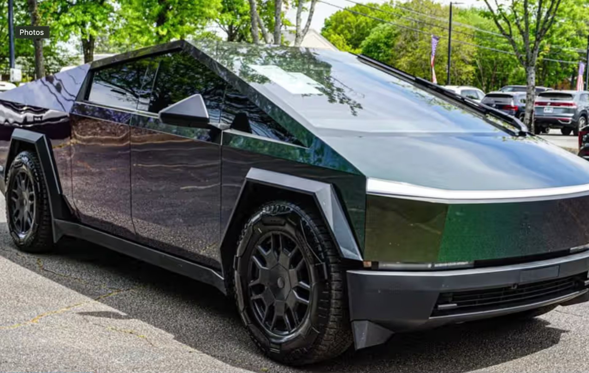 black and brown leather padded tub sofa