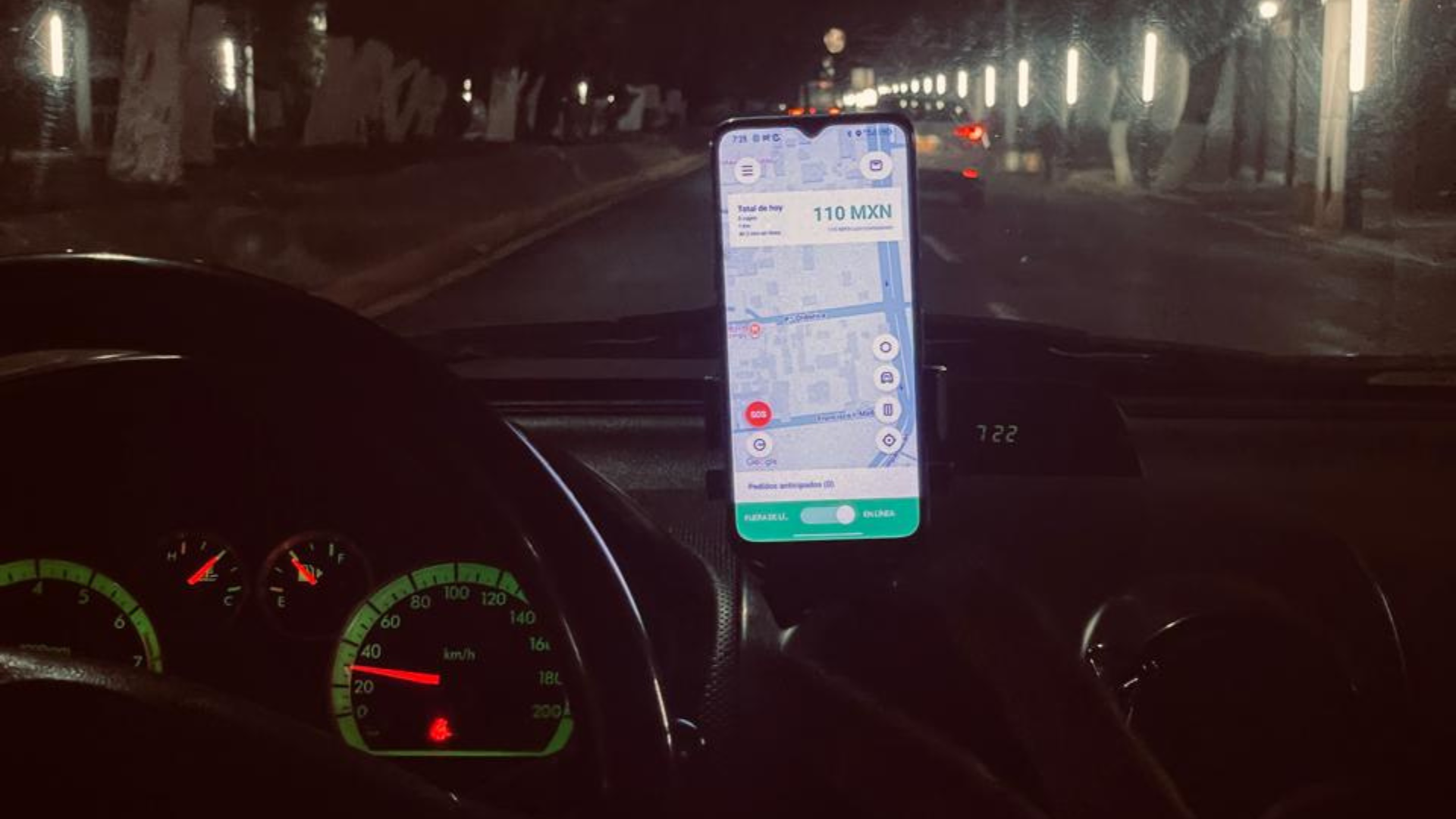 person holding iphone 6 inside car