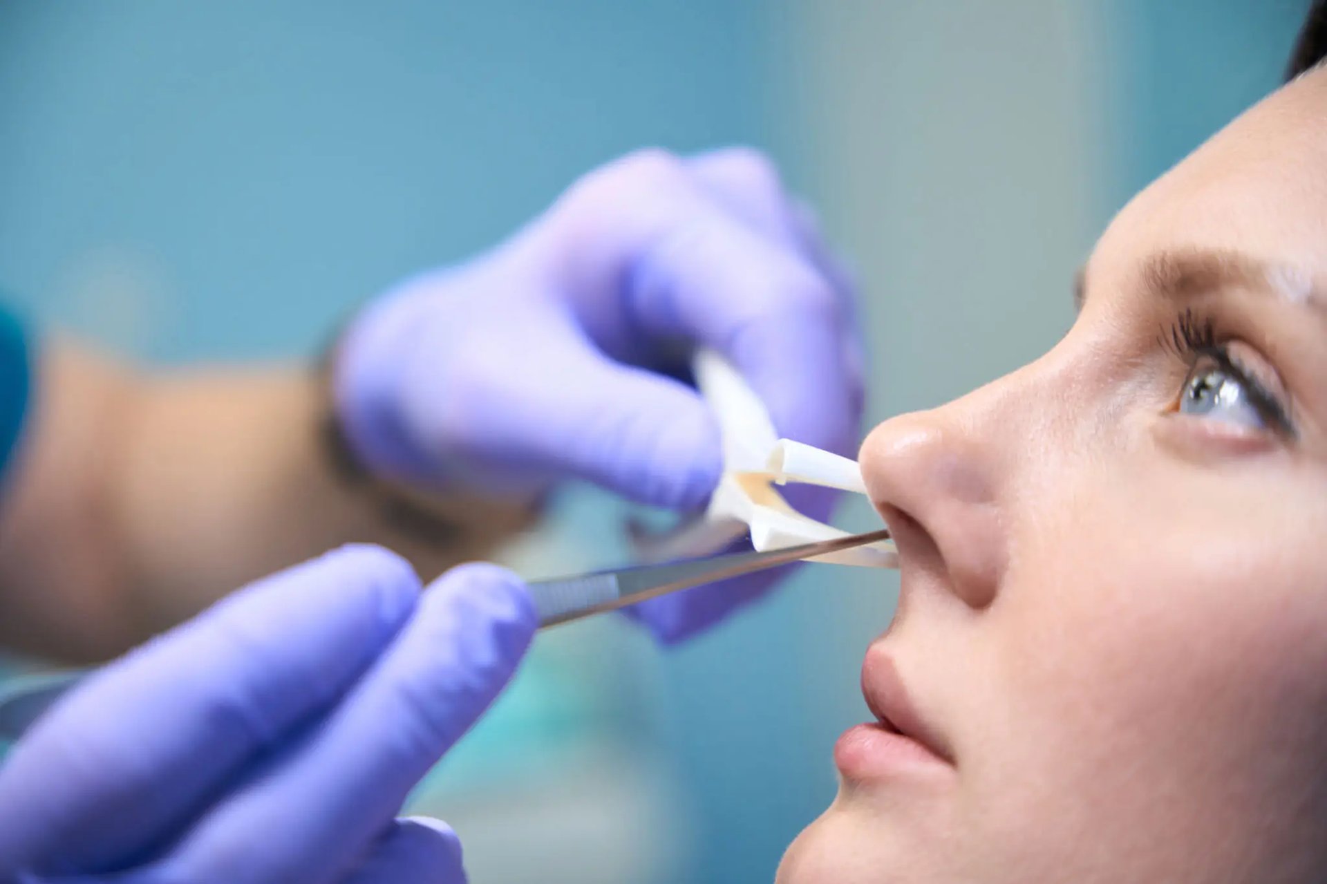 person holding yellow and white pen