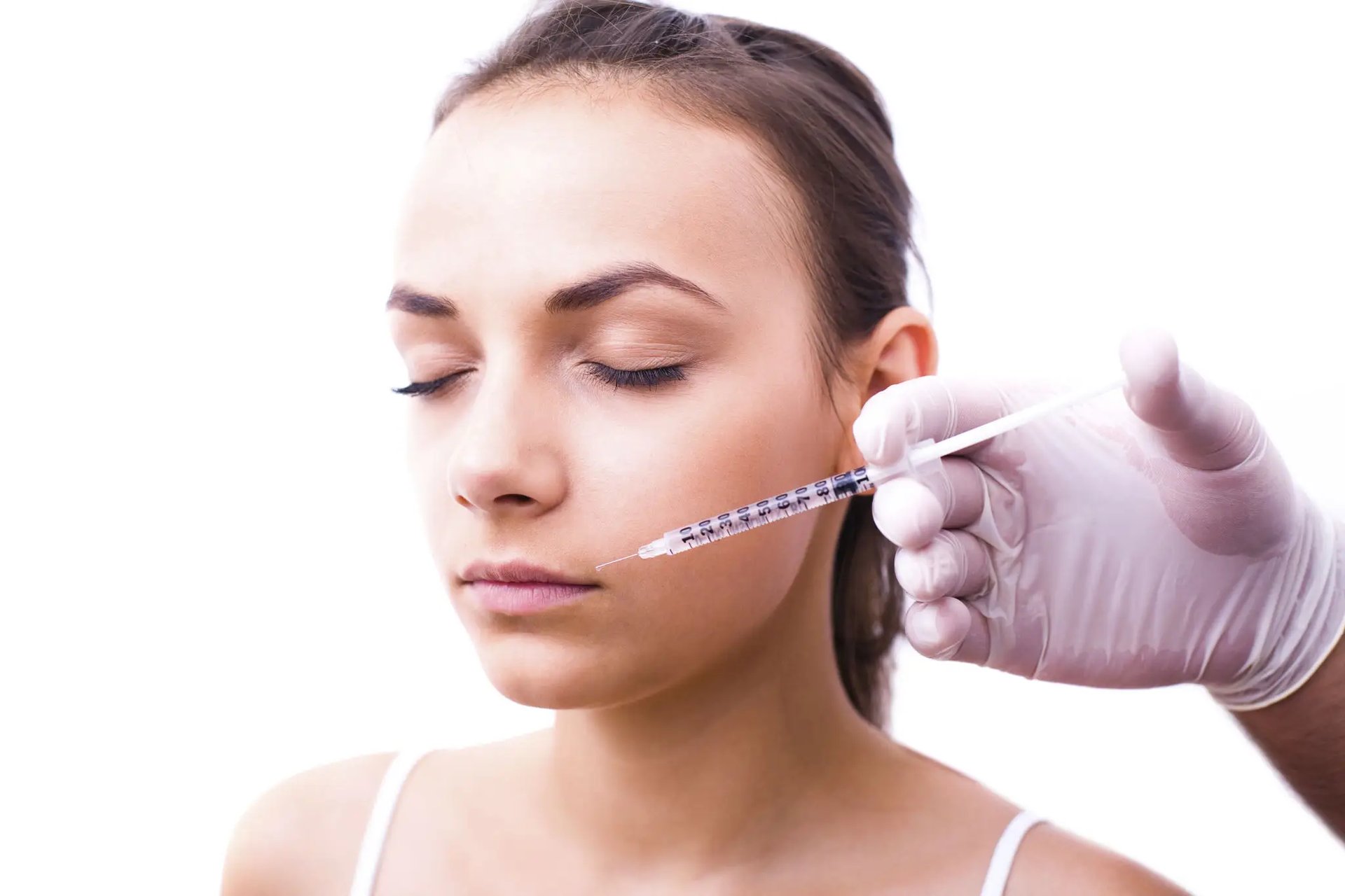 person holding yellow and white pen