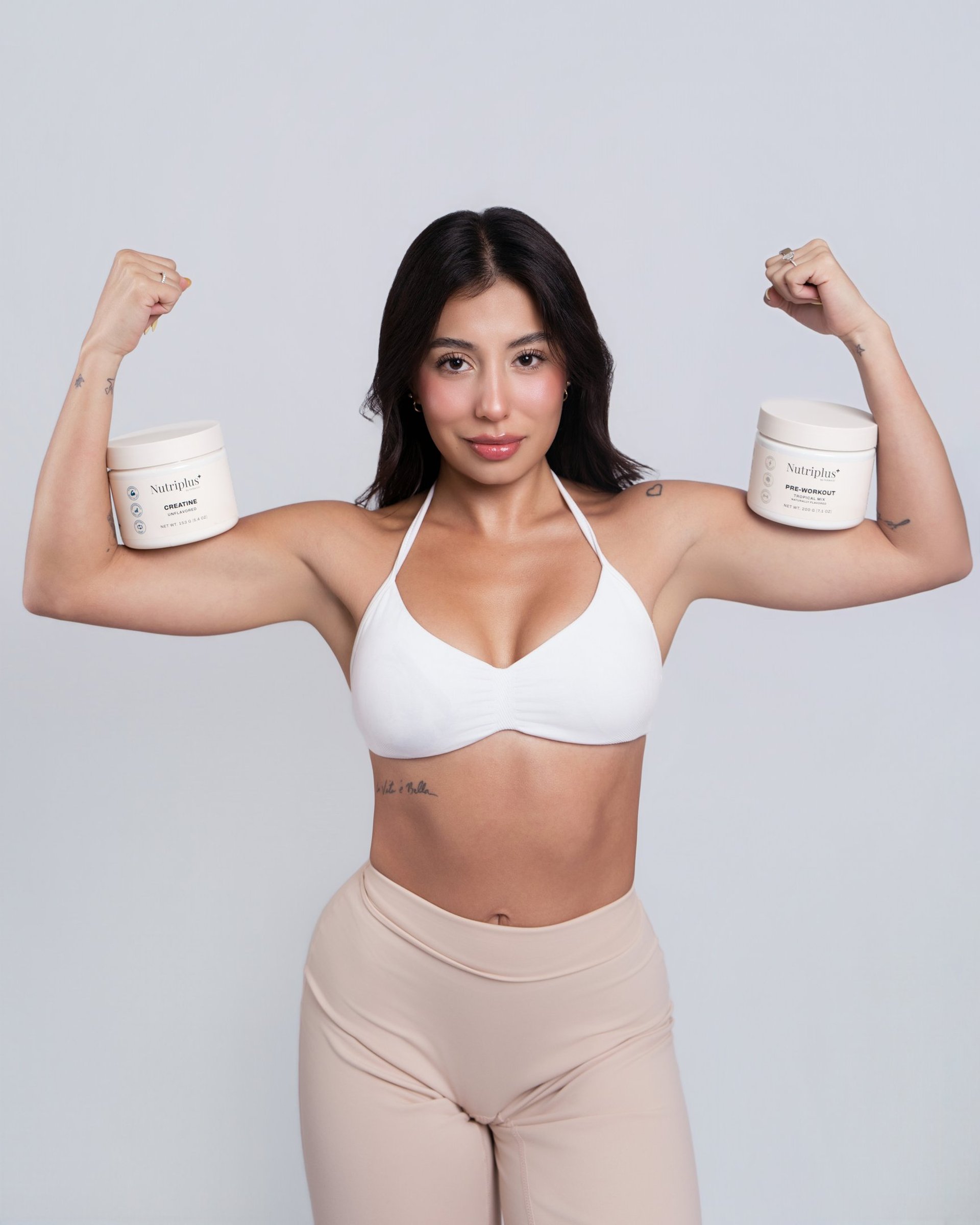 Woman doing pilates on a reformer machine.