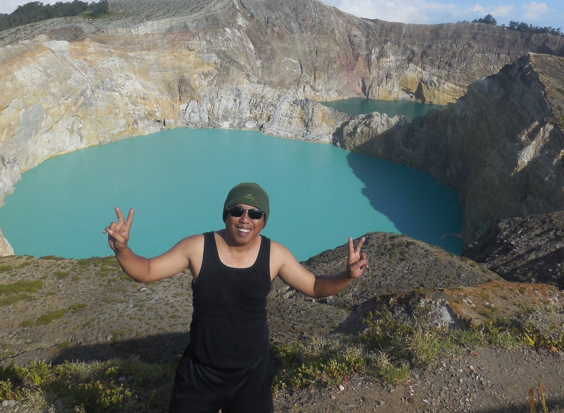 an abstract photo of a curved building with a blue sky in the background
