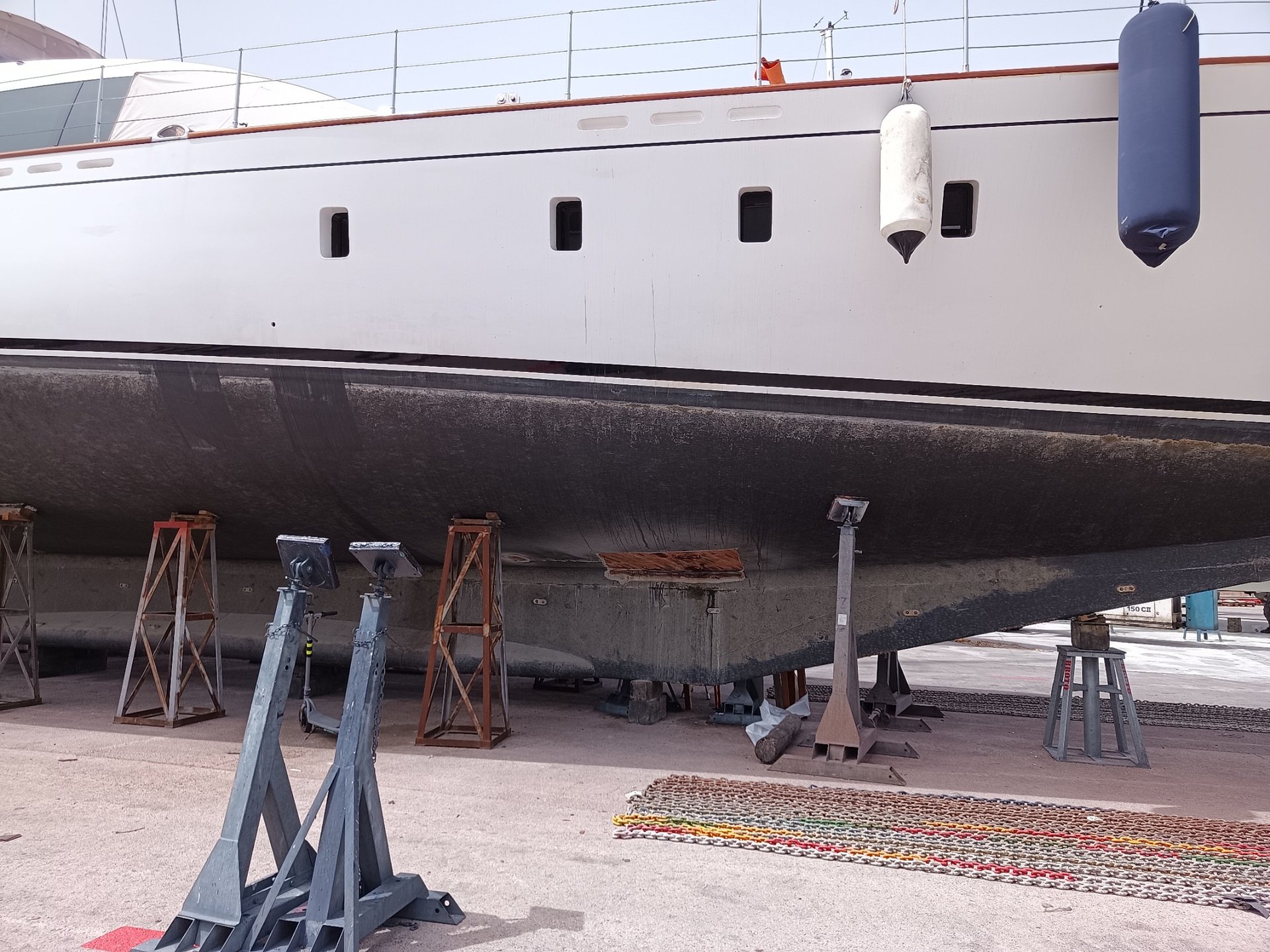 an abstract photo of a curved building with a blue sky in the background
