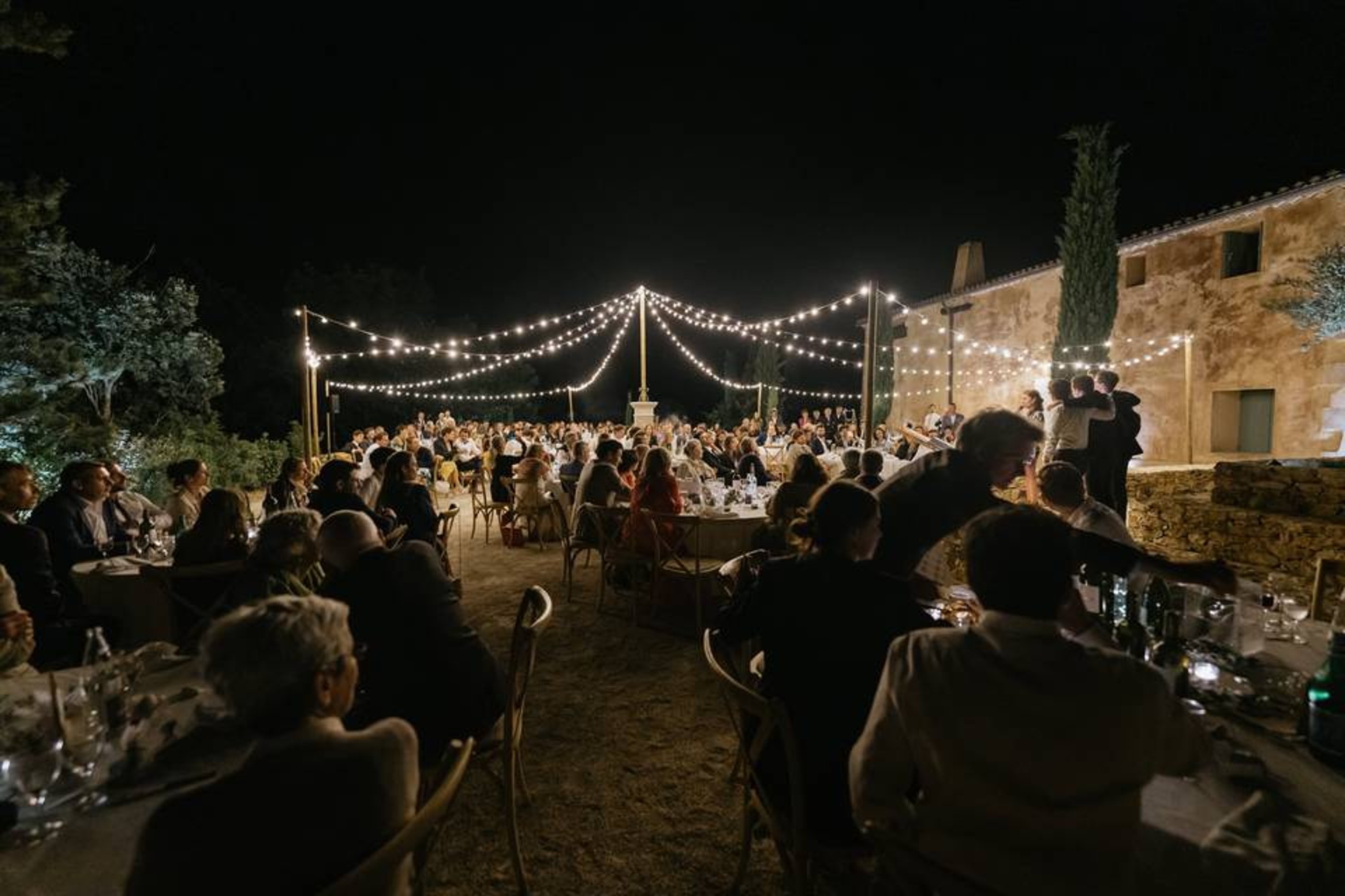 an abstract photo of a curved building with a blue sky in the background