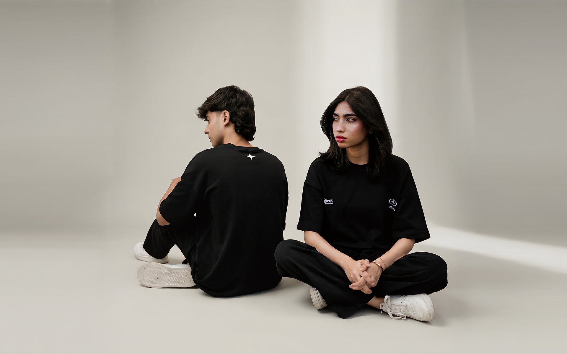 a closet filled with lots of different types of shirts