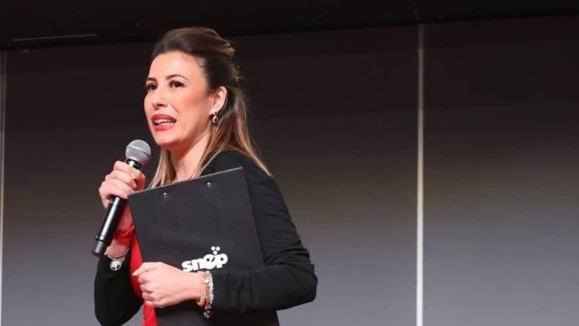 woman wearing yellow long-sleeved dress under white clouds and blue sky during daytime
