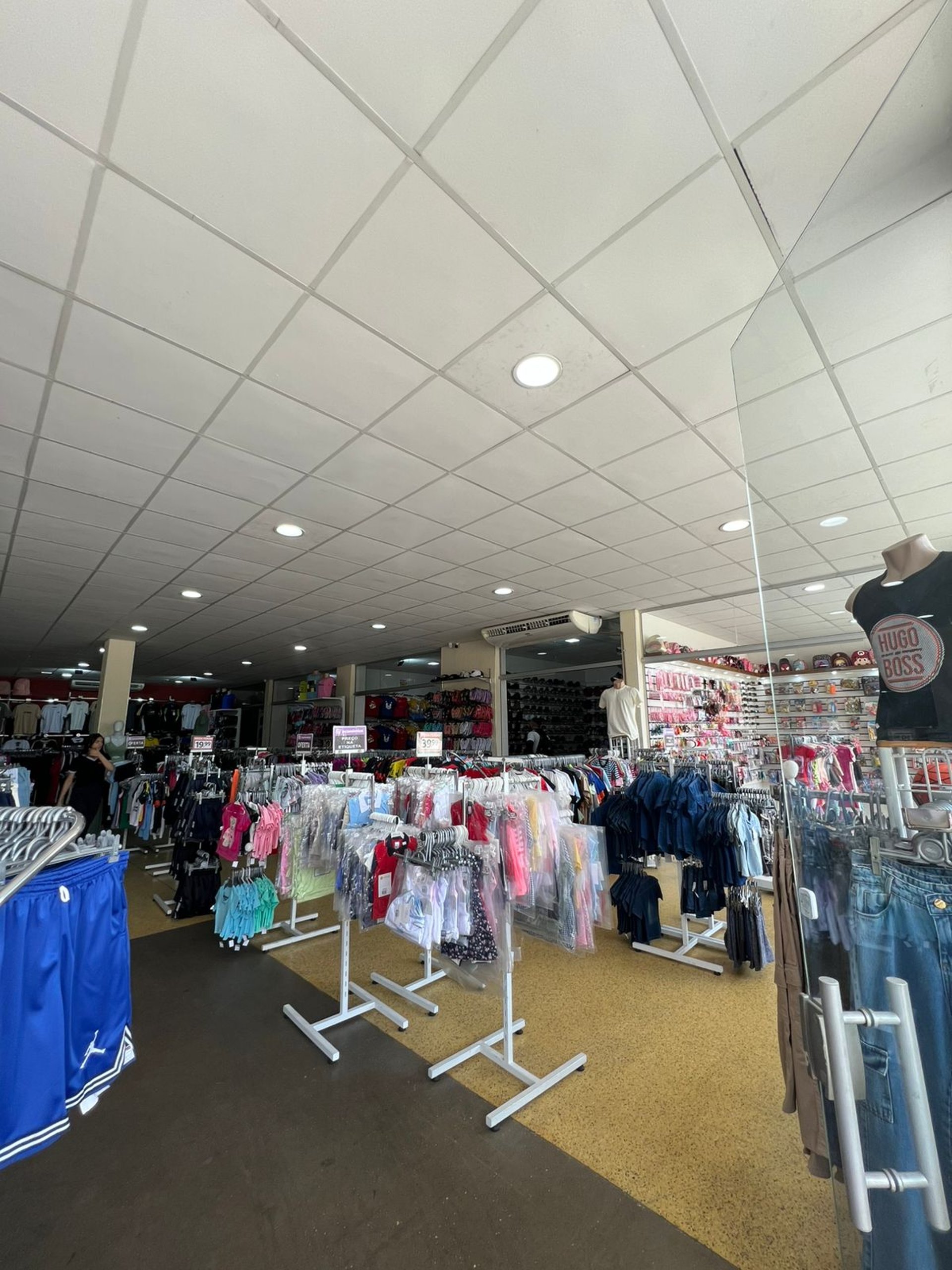 woman wearing yellow long-sleeved dress under white clouds and blue sky during daytime