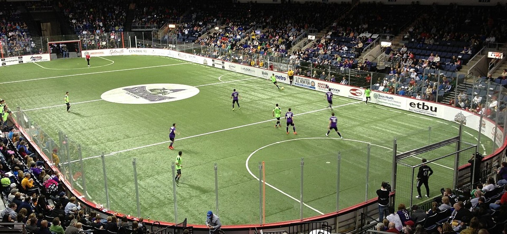 black and brown leather padded tub sofa